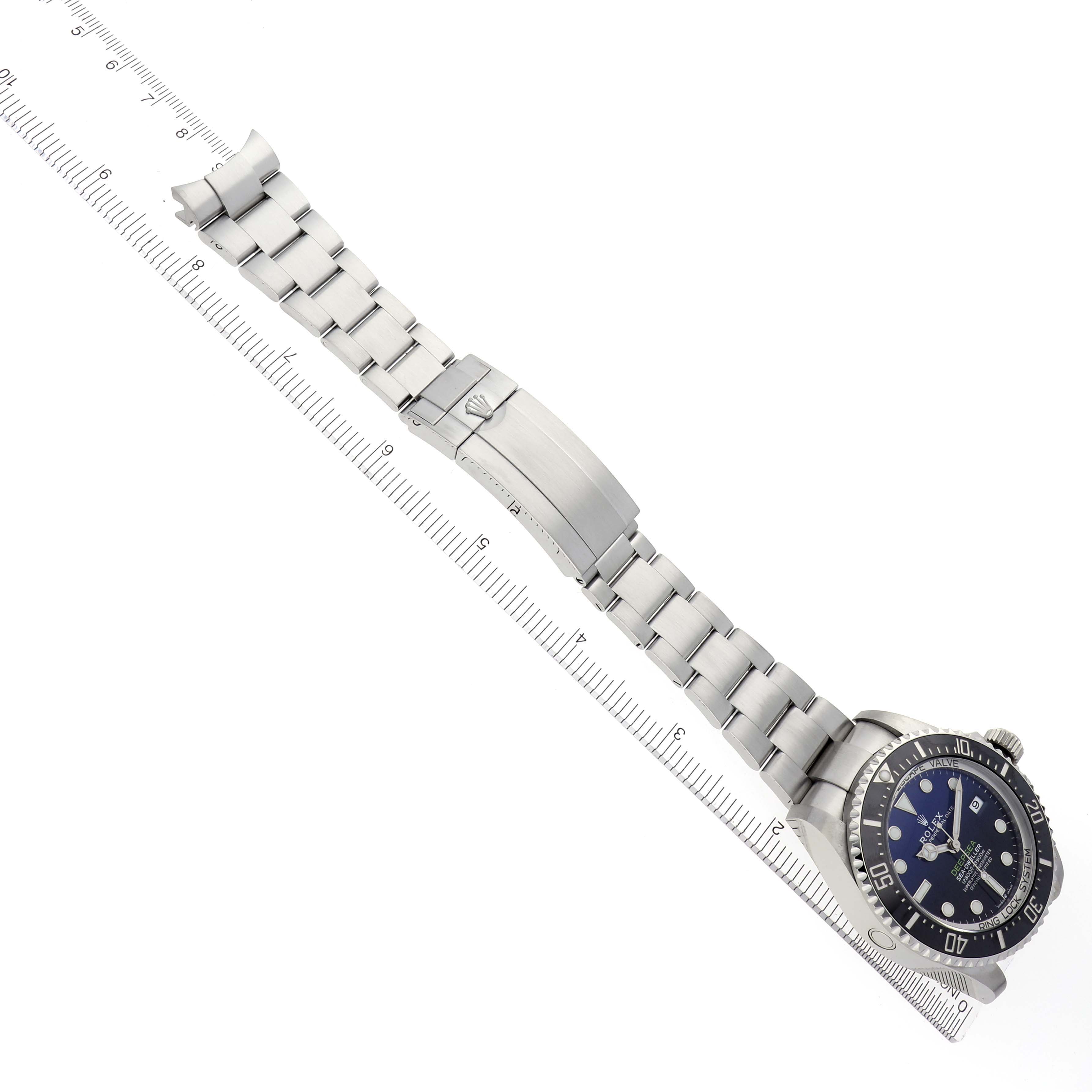 The Rolex Sea-Dweller M136660-0005 Men's Stainless Steel Blue Dial M136660-0005 Men's Stainless Steel Blue Dial watch is shown from a top view, highlighting its face, bracelet, and clasp.