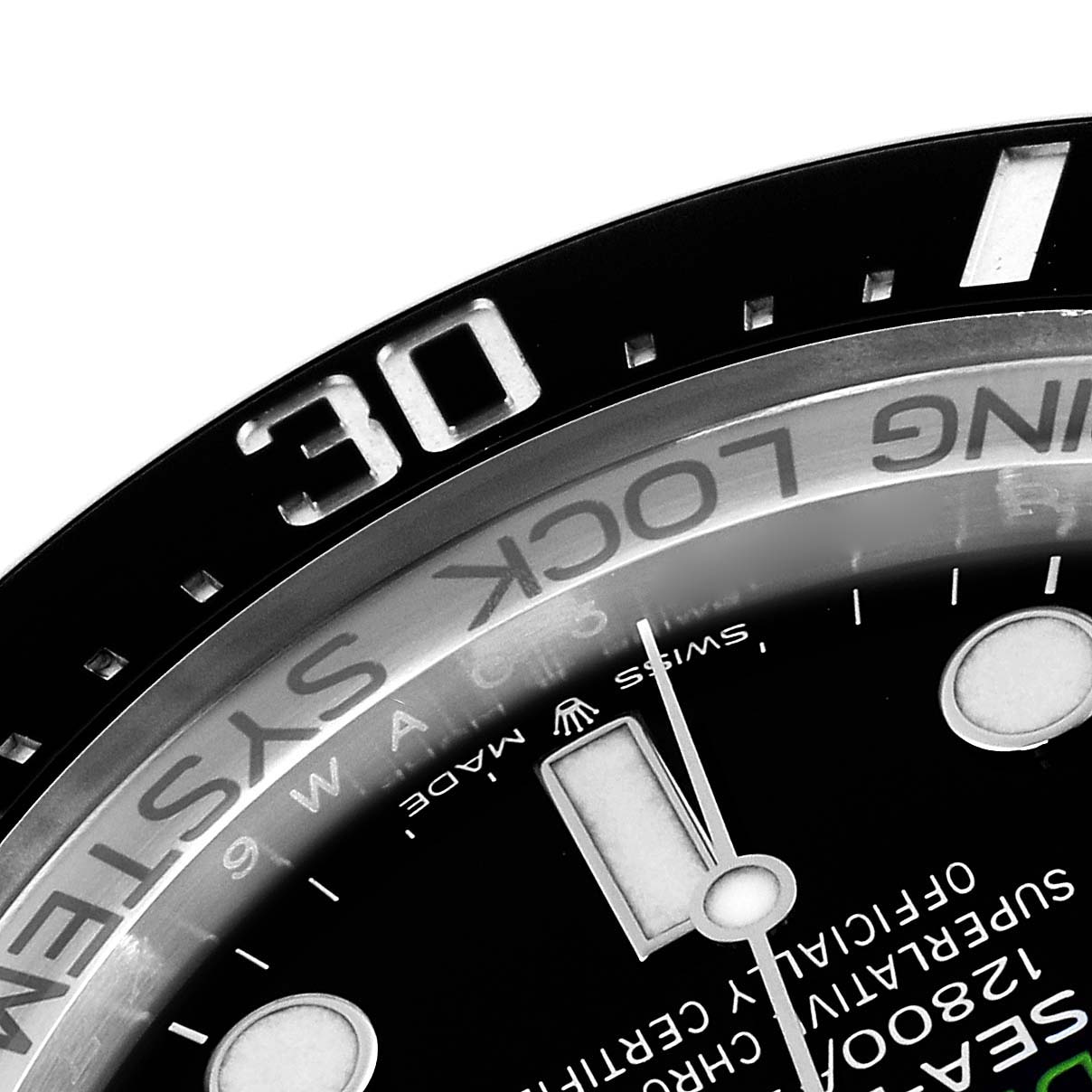The image shows a close-up of the bezel and dial of a Rolex Sea-Dweller M136660-0005 Men's Stainless Steel Blue Dial M136660-0005 Men's Stainless Steel Blue Dial watch, highlighting the 30-minute marker and text details.