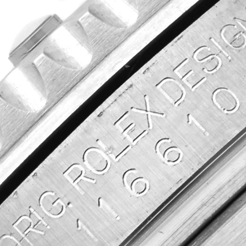 The image shows a close-up of the side engraving on a Rolex Submariner 116610LV Men's Stainless Steel Green Dial 116610LV Men's Stainless Steel Green Dial, featuring the model number and "ORIG ROLEX DESIGN."