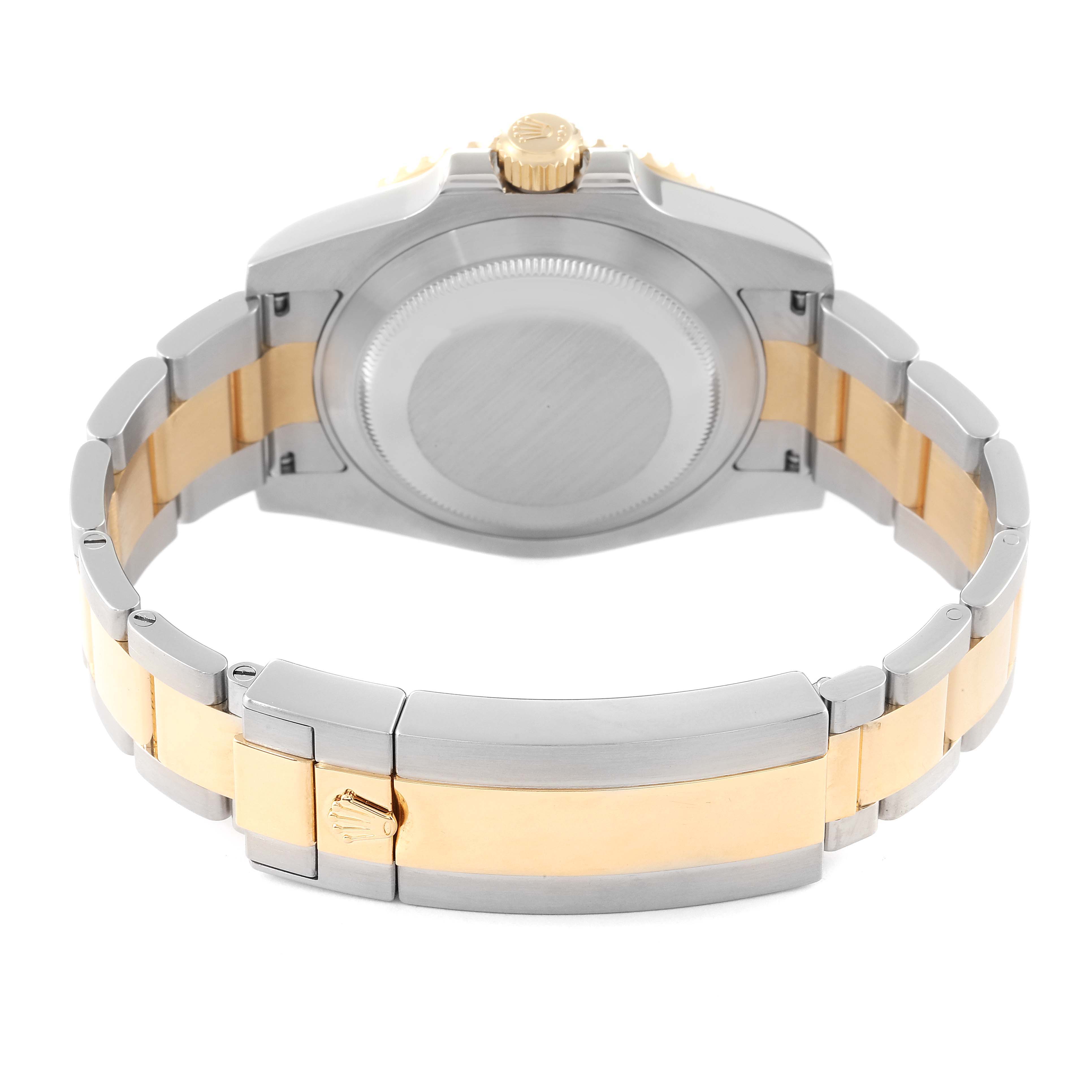 This image shows the back case and bracelet of a Rolex Submariner 116613 Men's Steel and Gold (two tone) Black Dial 116613 Men's Steel and Gold (two tone) Black Dial watch, featuring gold and stainless steel links.