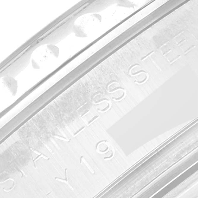 This close-up image shows part of the stainless steel bezel and case back of a Rolex Yacht-Master 169622 Women
s Stainless Steel Silver Dial 169622 Women
s Stainless Steel Silver Dial watch.