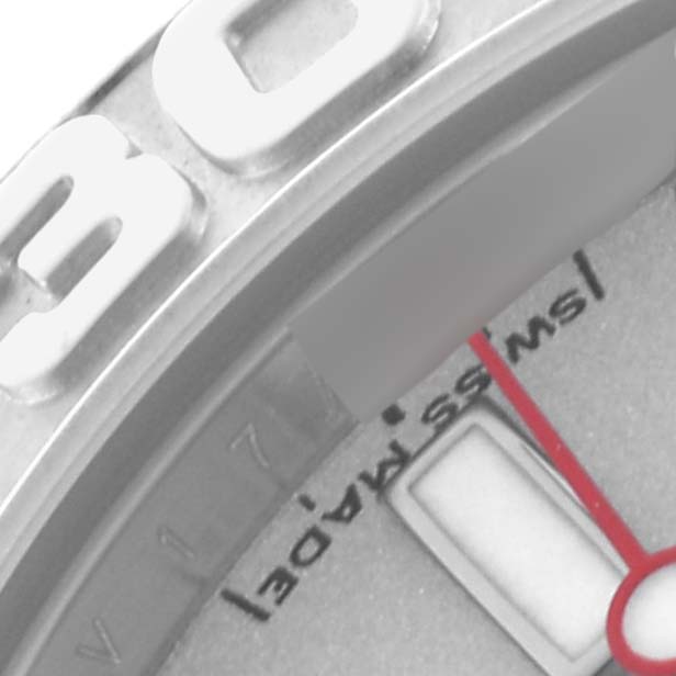 The image shows a close-up of a Rolex Yacht-Master 168622 Men
s Stainless Steel Silver Dial 168622 Men
s Stainless Steel Silver Dial, focusing on part of the bezel, dial, and part of the date.