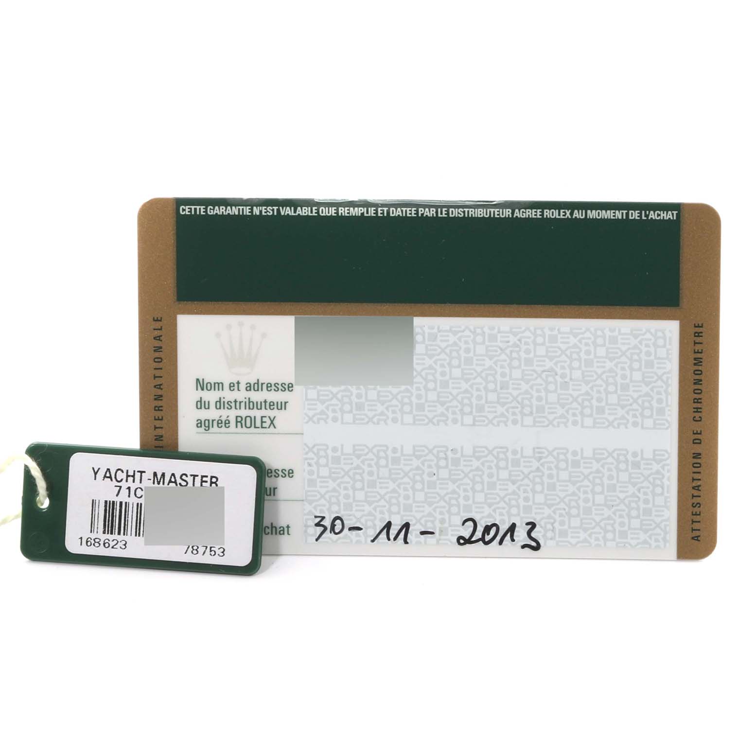 The image shows a Rolex Yacht-Master 168623 Men's Steel and Gold (two tone) Grey Dial 168623 Men's Steel and Gold (two tone) Grey Dial warranty card and a green Rolex tag with model information.