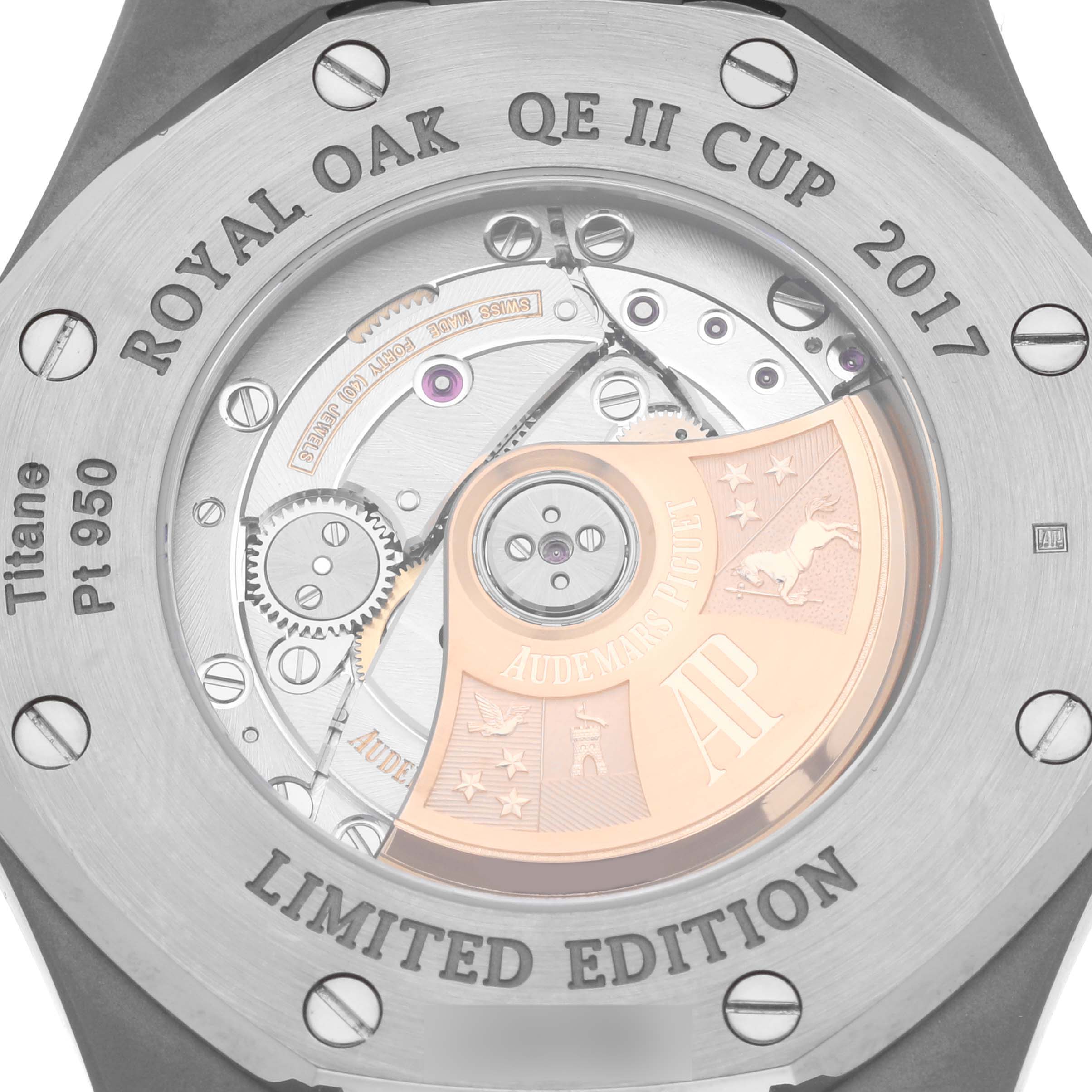 The image shows the back of the Audemars Piguet Royal Oak 15403IP.OO.1220IP.01 Men's Platinum Silver Dial 15403IP.OO.1220IP.01 Men's Platinum Silver Dial watch, highlighting the movement and engraved rotor.