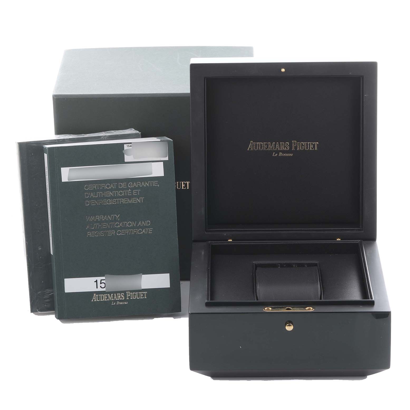 The image shows the Audemars Piguet Royal Oak 15403IP.OO.1220IP.01 Men's Platinum Silver Dial 15403IP.OO.1220IP.01 Men's Platinum Silver Dial model packaging and warranty booklets, with the box lid open and visible from the front.