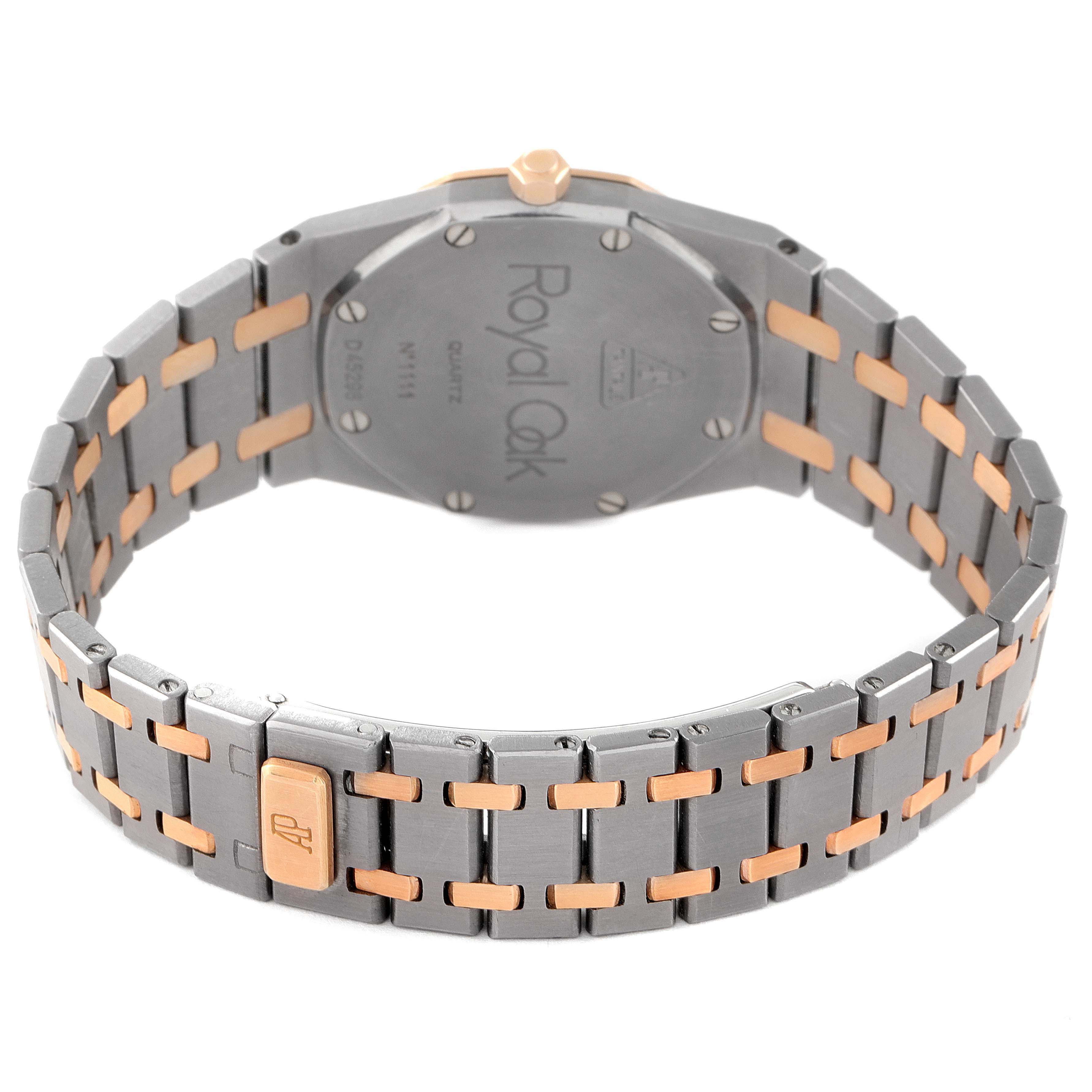 The image shows the back view and bracelet of an Audemars Piguet Royal Oak 56175TR-OO-0789TR-01 Men
s Titanium Black Dial 56175TR-OO-0789TR-01 Men
s Titanium Black Dial watch, highlighting the clasp and case back.