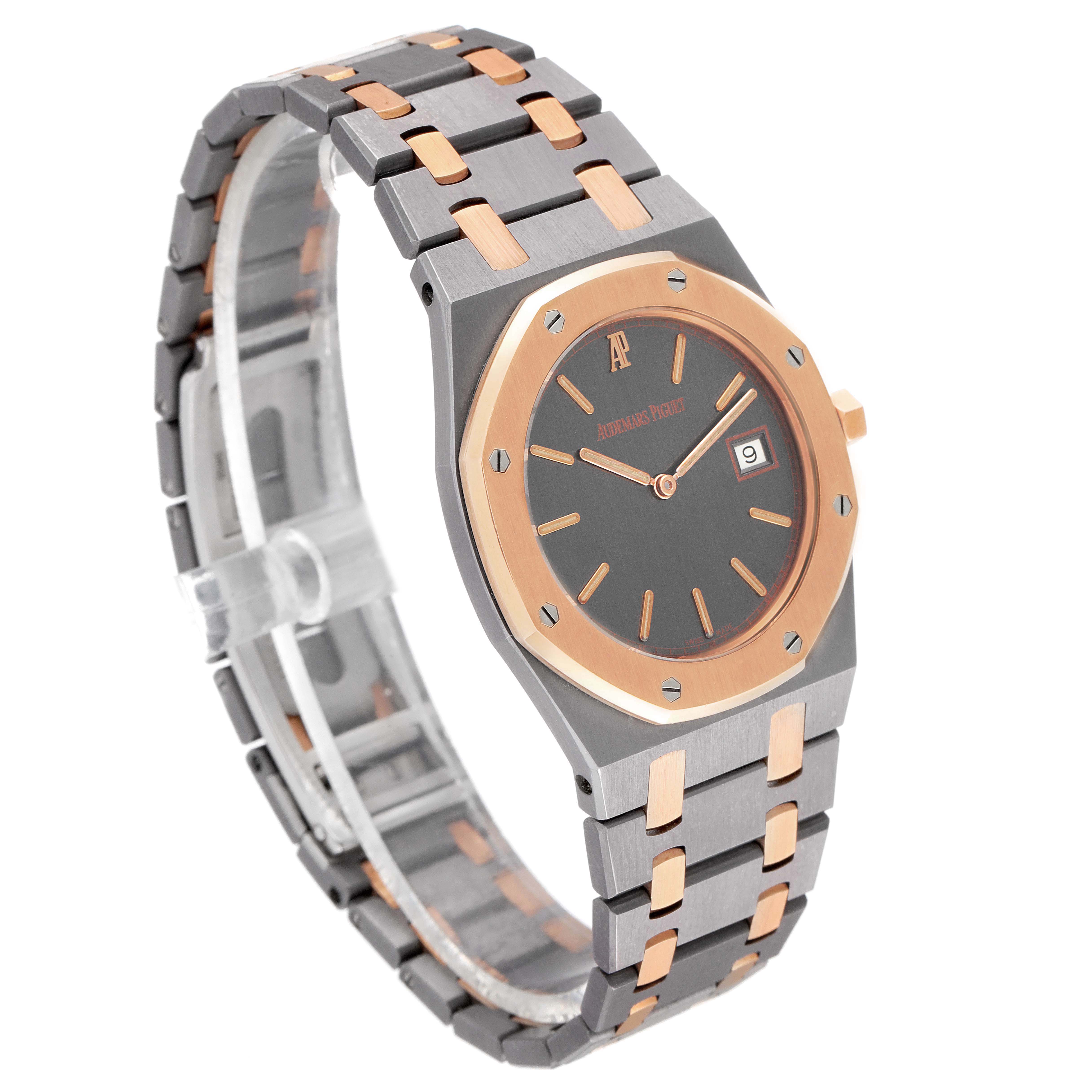 This image shows the Audemars Piguet Royal Oak 56175TR-OO-0789TR-01 Men
s Titanium Black Dial 56175TR-OO-0789TR-01 Men
s Titanium Black Dial watch from a 3/4 angle, highlighting the face, bezel, crown, and bracelet.