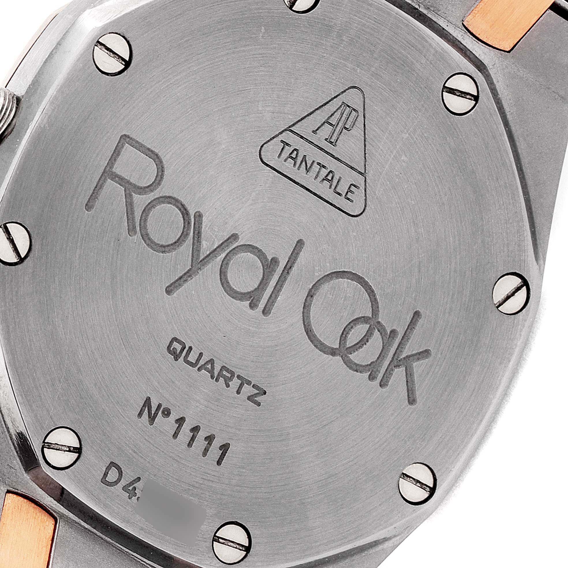 This image shows the back case with inscriptions and screws of the Audemars Piguet Royal Oak 56175TR-OO-0789TR-01 Men
s Titanium Black Dial 56175TR-OO-0789TR-01 Men
s Titanium Black Dial Quartz model.