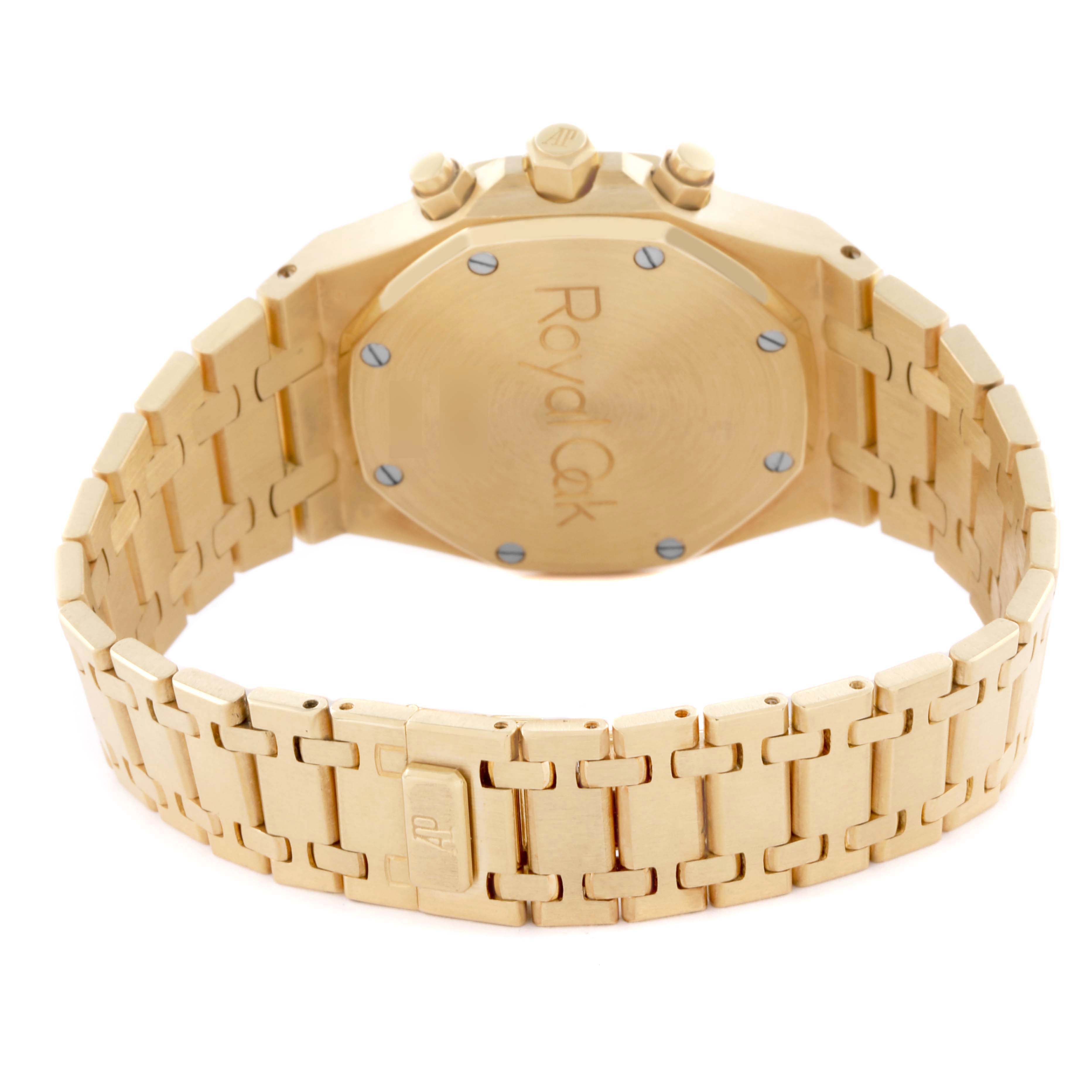 The image shows the back of a Royal Oak watch by Audemars Piguet, highlighting the case back, bracelet, and clasp.