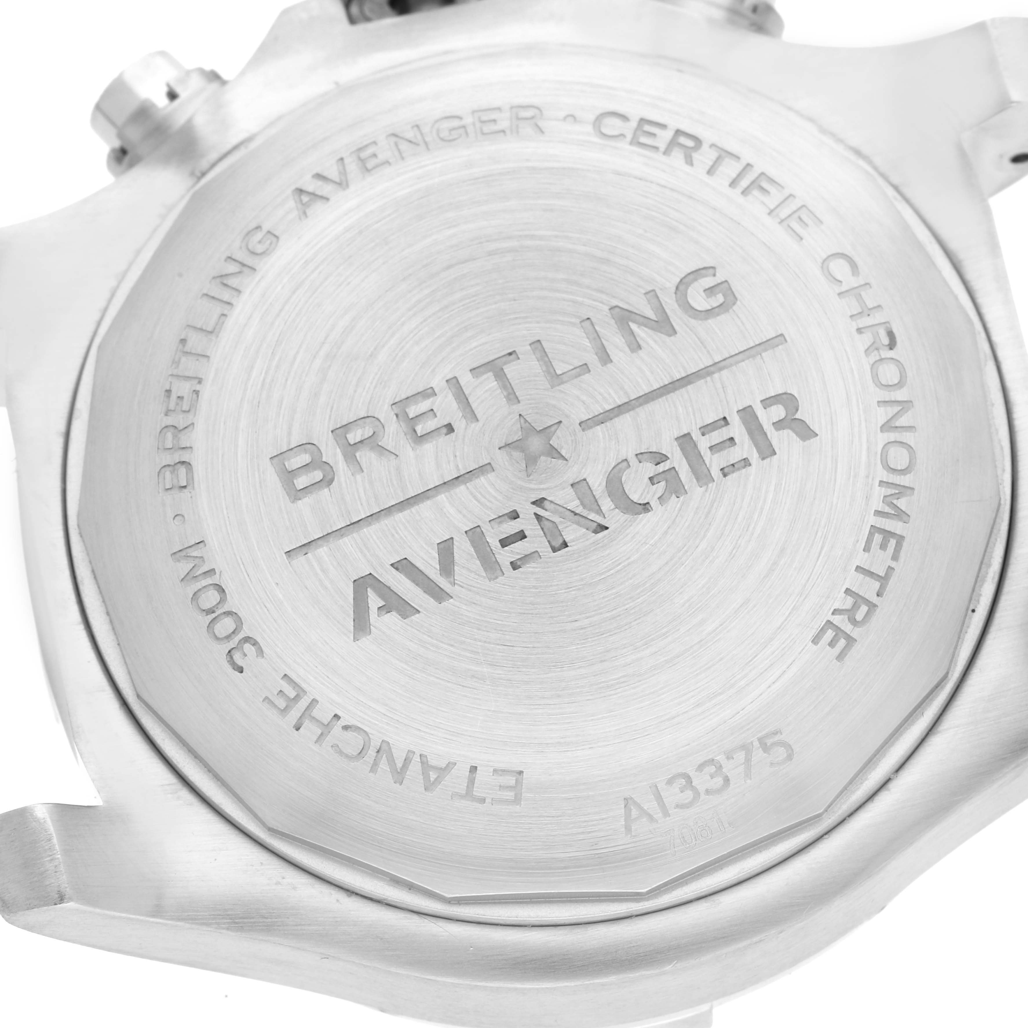 The image shows the case back of a Breitling Avenger A13375 Men's Stainless Steel Black Dial A13375 Men's Stainless Steel Black Dial watch at a top-down angle.