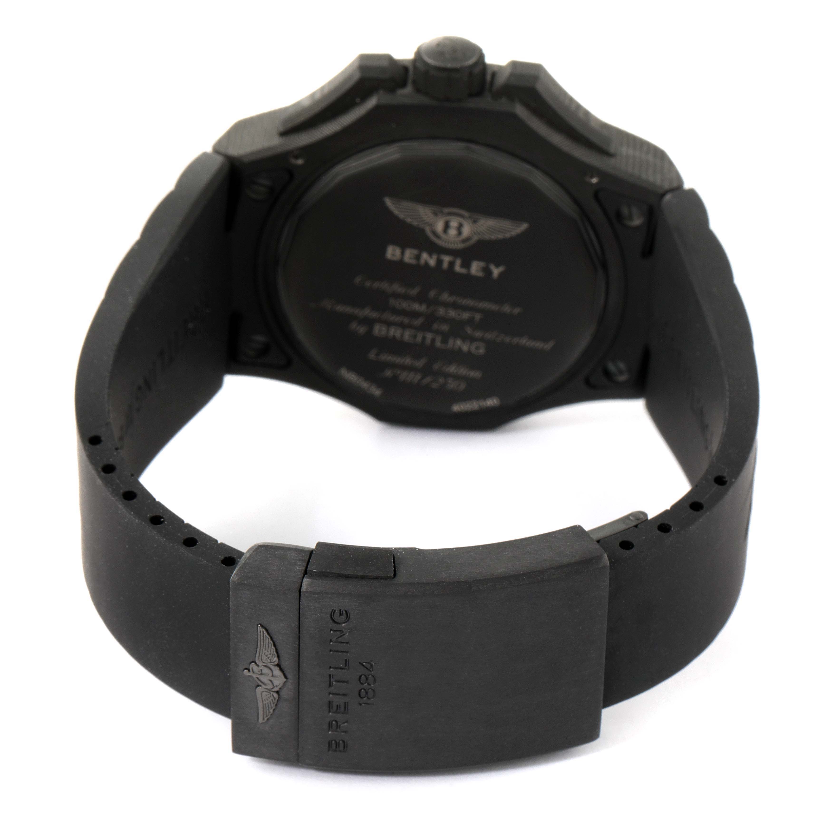 The image shows the backside of a Breitling Bentley NB0434E5/BE94 Men's Ceramic Black Dial NB0434E5/BE94 Men's Ceramic Black Dial model watch, including its case back and rubber strap with the clasp.