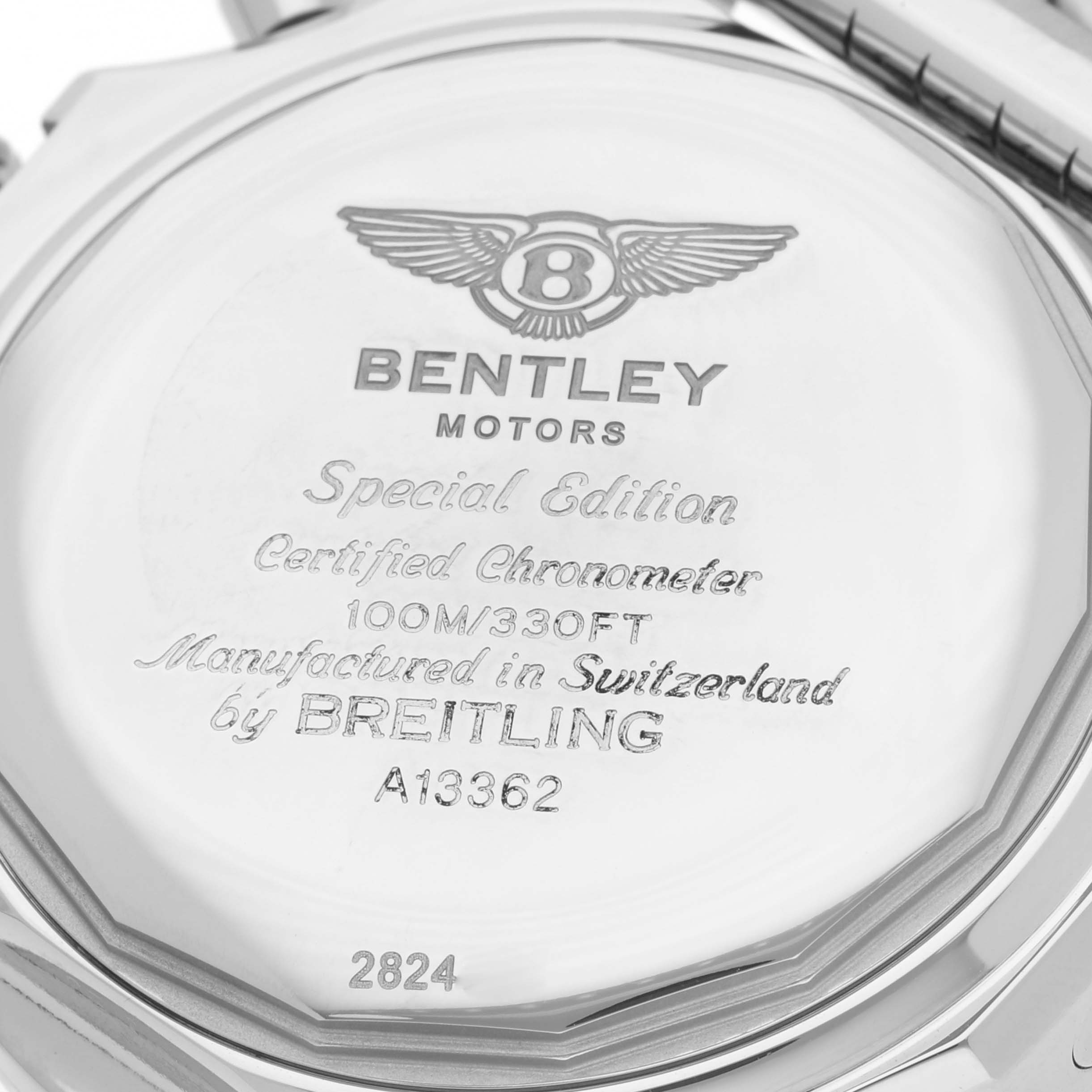 This image shows the back of a Bentley model watch by Breitling, highlighting engravings and specifications.