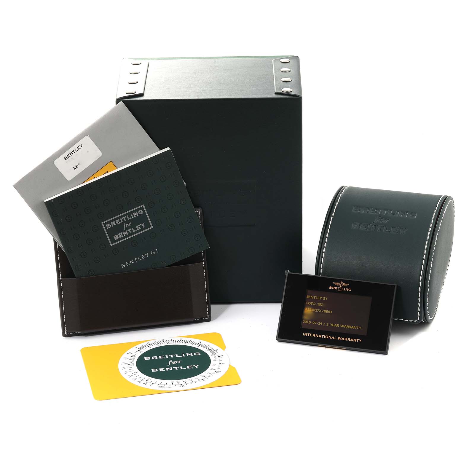 The image shows the packaging and documentation for a Bentley model by Breitling, including boxes, manuals, and warranty card.