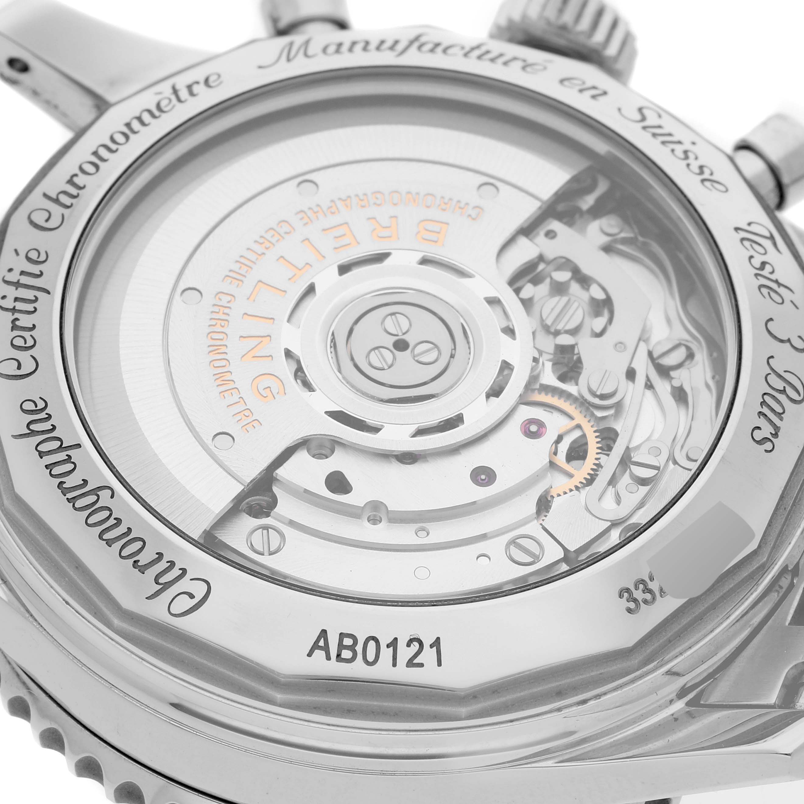 This image shows the back of a Breitling Navitimer AB0121 Men
s Stainless Steel Mother of Pearl Dial AB0121 Men
s Stainless Steel Mother of Pearl Dial watch, displaying its intricate mechanical movement.