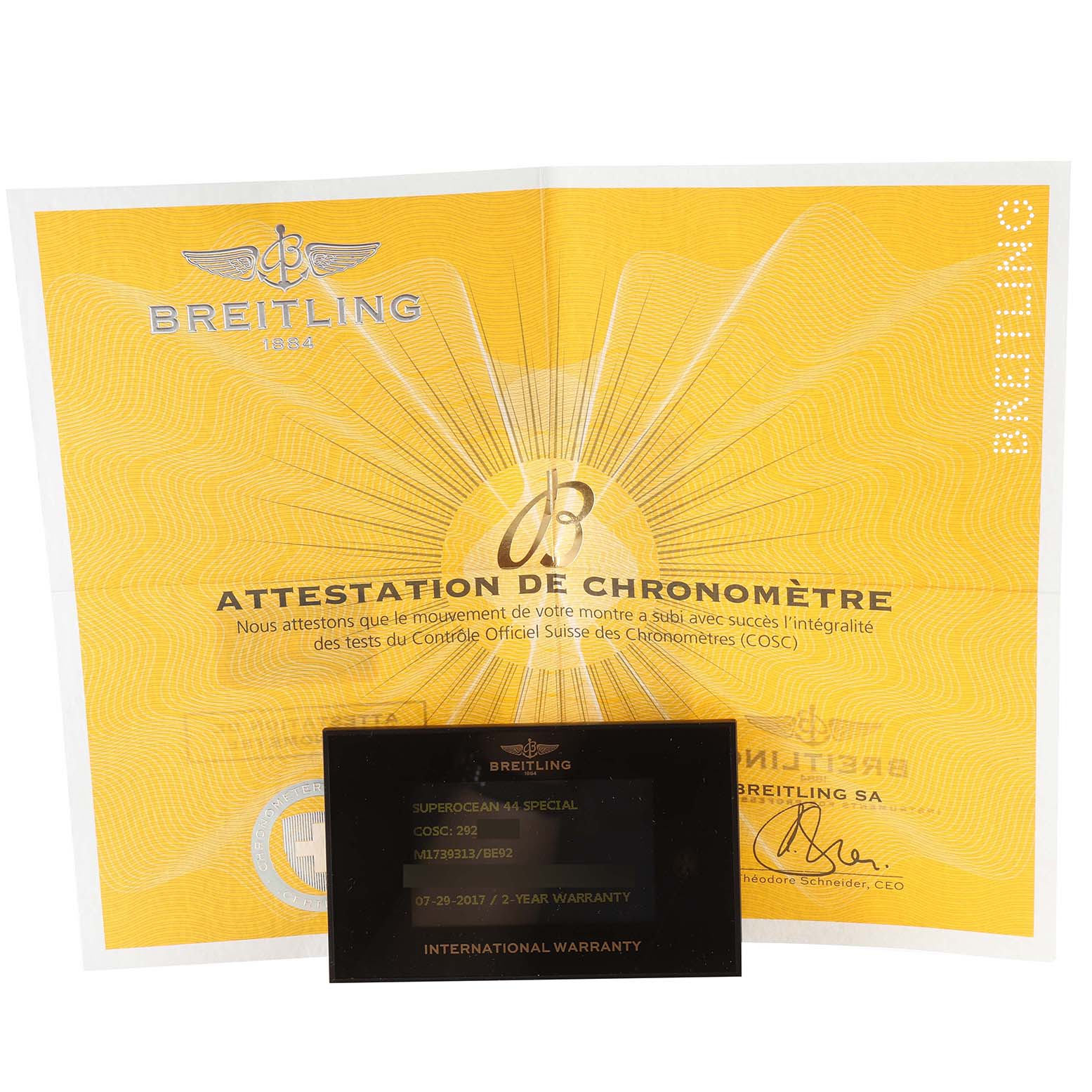 This image shows the warranty card and chronometer certificate for the Breitling Superocean M17393 Men's Stainless Steel Black Dial M17393 Men's Stainless Steel Black Dial watch model.