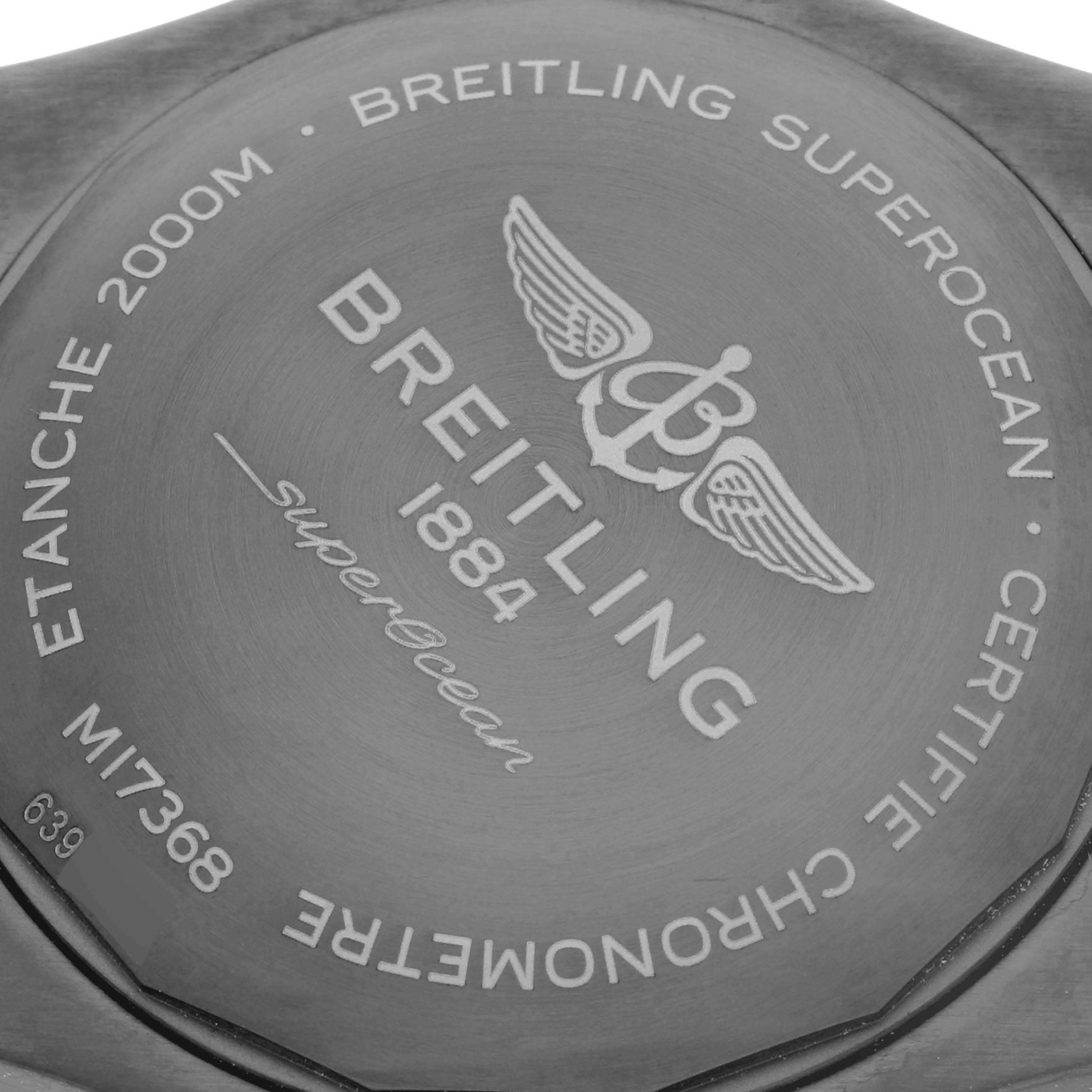 This image shows the back case of the Breitling Superocean M17368B71B1S2 Men's Stainless Steel Black Dial M17368B71B1S2 Men's Stainless Steel Black Dial watch with its engravings and branding.