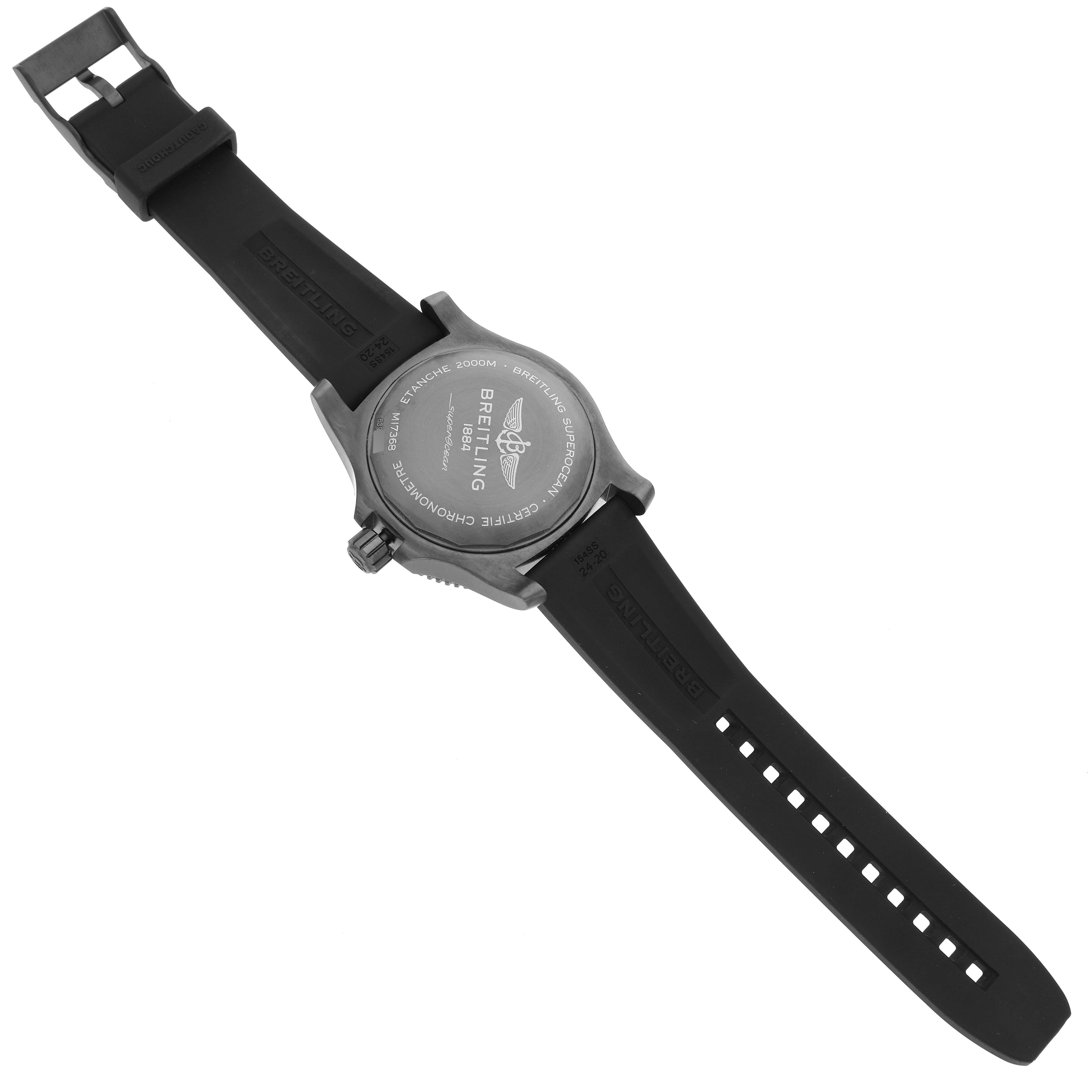 This image shows the back of a Breitling Superocean M17368B71B1S2 Men's Stainless Steel Black Dial M17368B71B1S2 Men's Stainless Steel Black Dial watch along with its black rubber strap, displayed flat.