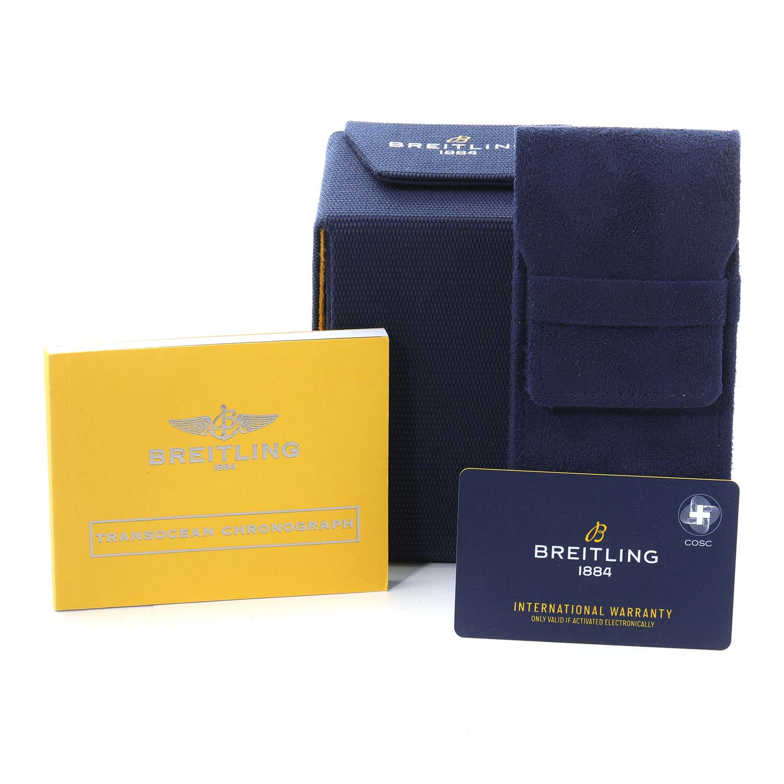 The image shows the packaging and accessories for a Breitling Transocean RB0510U4-BB63BKLD Men's Rose Gold White Dial RB0510U4-BB63BKLD Men's Rose Gold White Dial Chronograph, including a box, a pouch, a manual, and a warranty card.