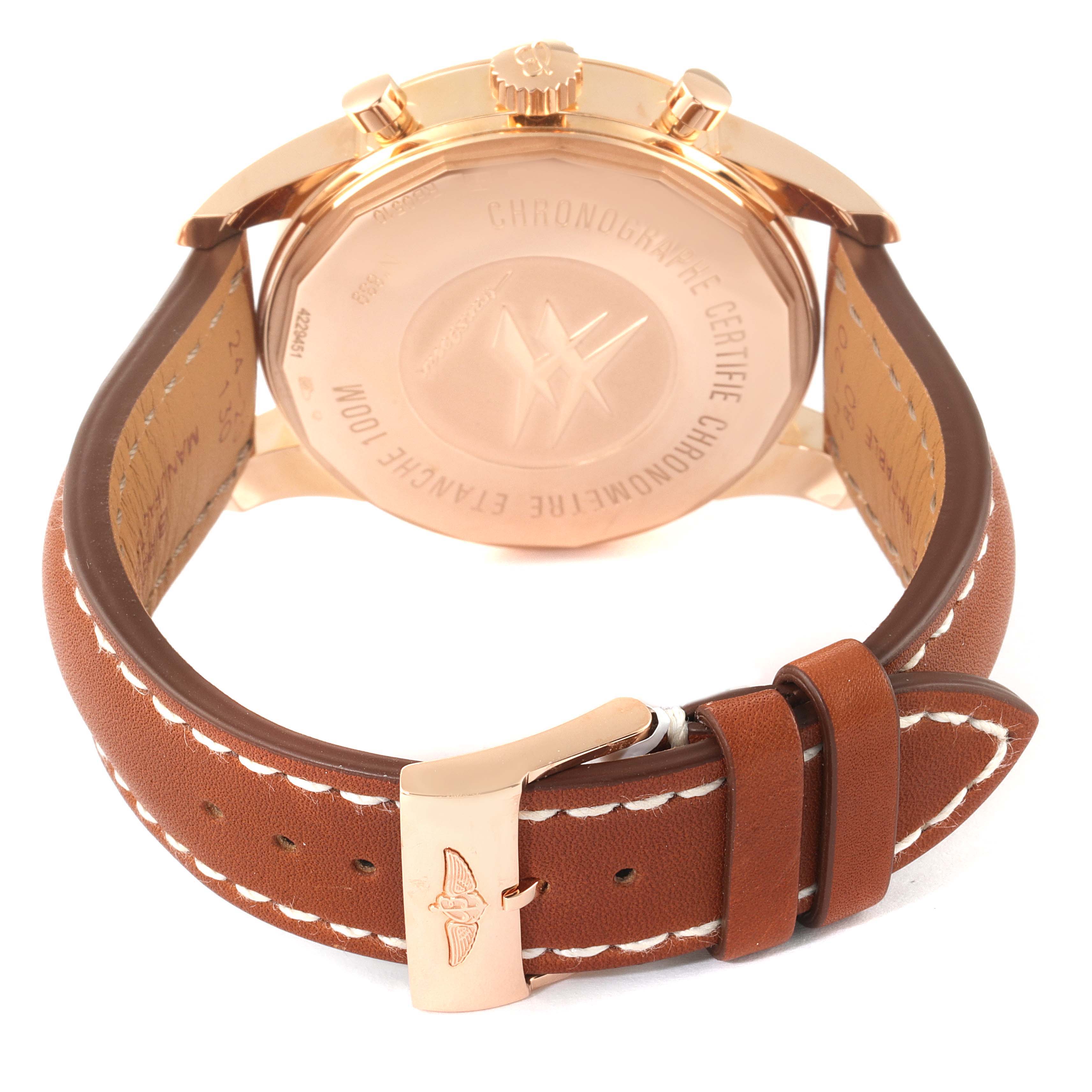 The image shows the back case, crown, pushers, and brown leather strap with clasp of a Breitling Transocean RB0510U4-BB63BKLD Men's Rose Gold White Dial RB0510U4-BB63BKLD Men's Rose Gold White Dial watch.