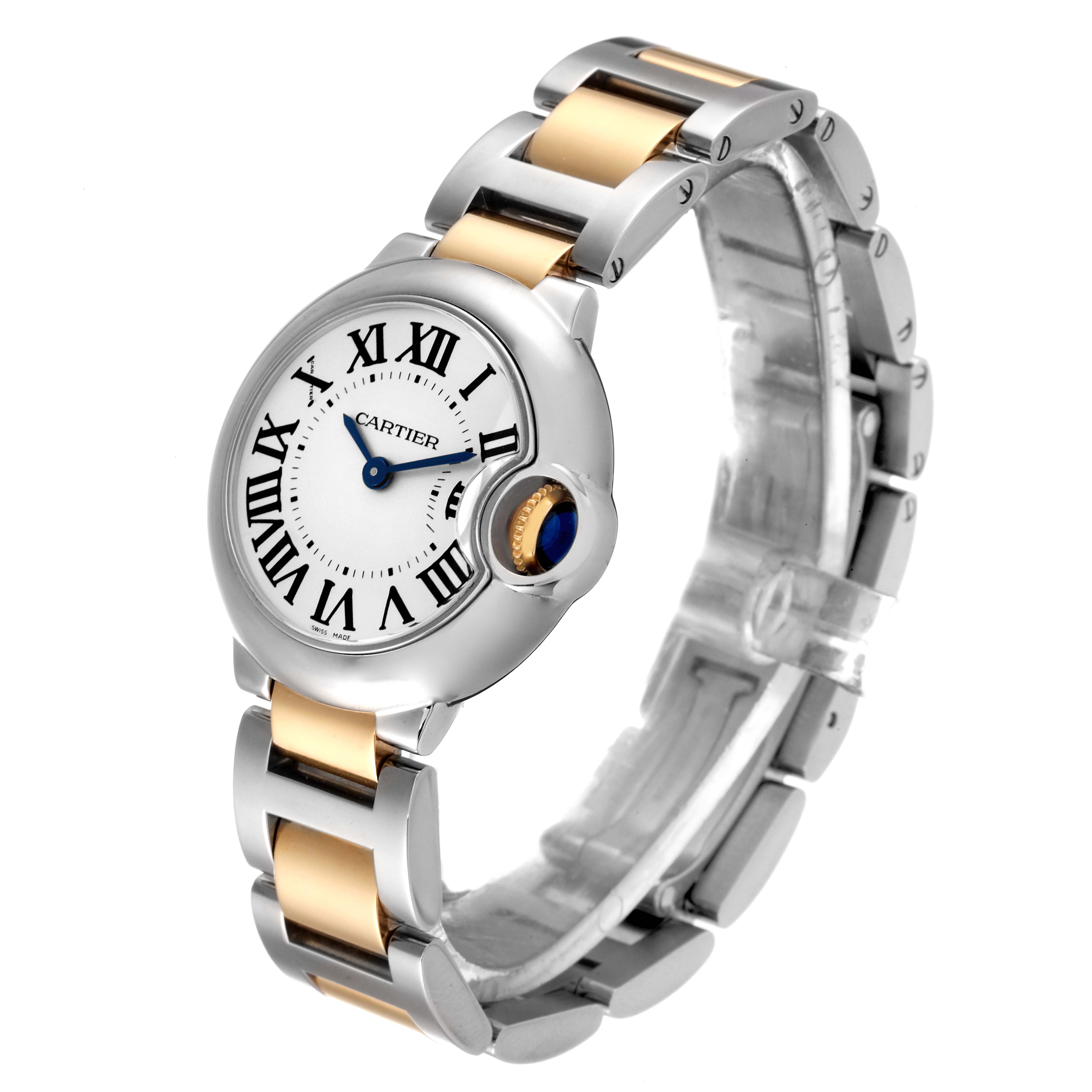 The Ballon Bleu de Cartier watch is shown from a front-left angle, displaying the face, bezel, and bracelet.