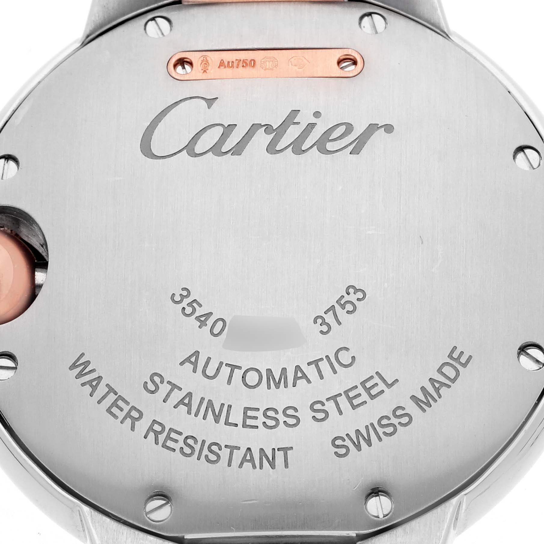 The image shows the back of a Cartier Ballon Bleu WE902077 Women
s Steel and Gold (two tone) Silver Dial WE902077 Women
s Steel and Gold (two tone) Silver Dial watch, highlighting its stainless steel and automatic movement features.