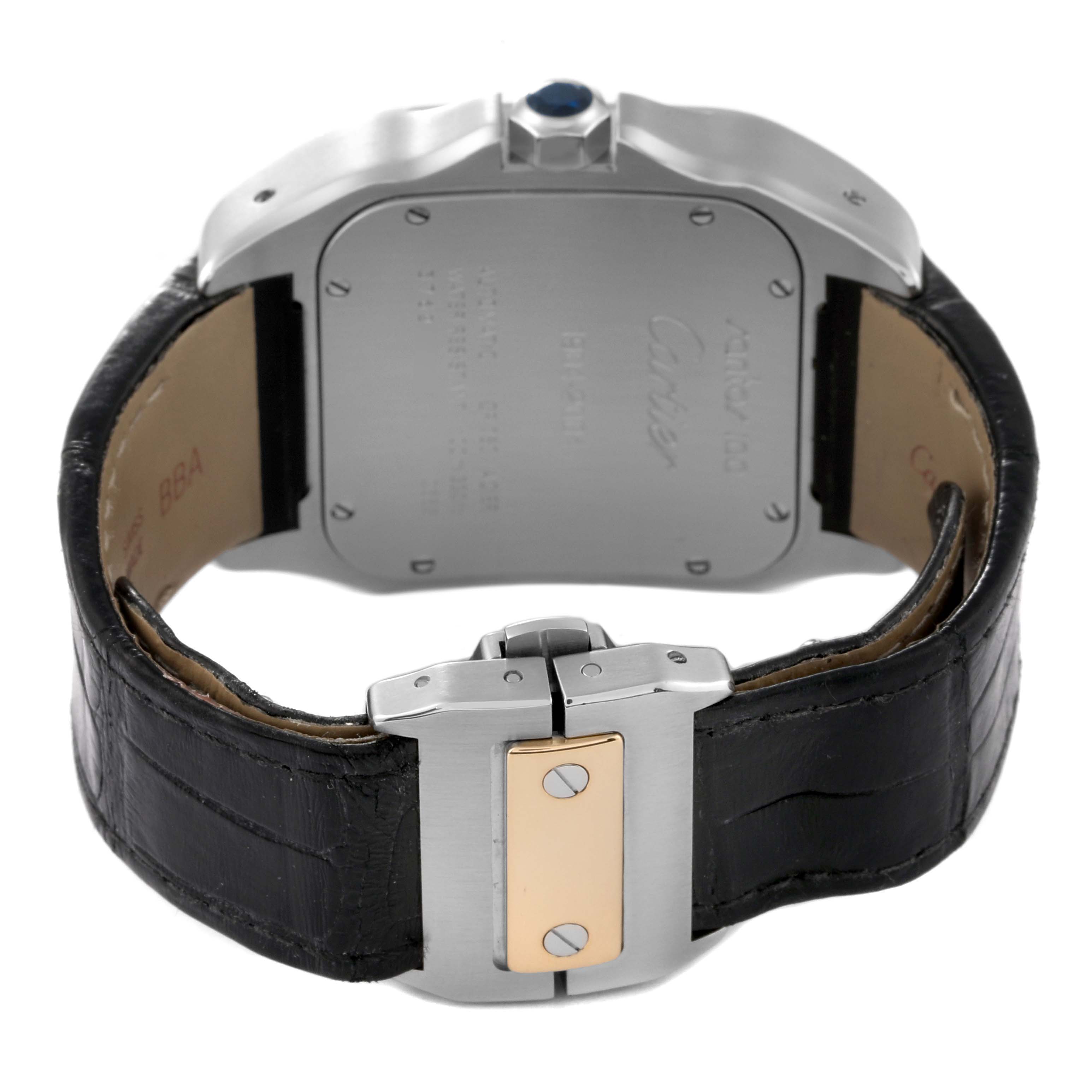 The image shows the rear view of a Cartier Santos W20072X7 Men's Steel and Gold (two tone) Silver Dial W20072X7 Men's Steel and Gold (two tone) Silver Dial watch, highlighting its case back, leather strap, and deployant clasp.