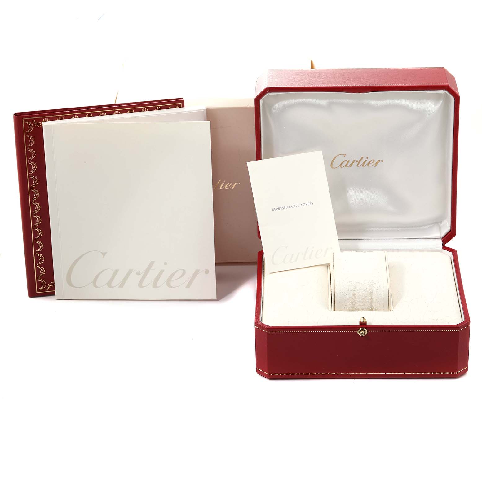 The image shows packaging and accessories for a Cartier Santos W20072X7 Men's Steel and Gold (two tone) Silver Dial W20072X7 Men's Steel and Gold (two tone) Silver Dial watch, including the inner and outer boxes and documentation.
