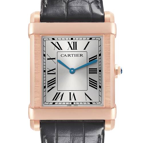 The Cartier Tank Louis watch is shown from a front angle, highlighting its rectangular face, Roman numerals, and leather strap.