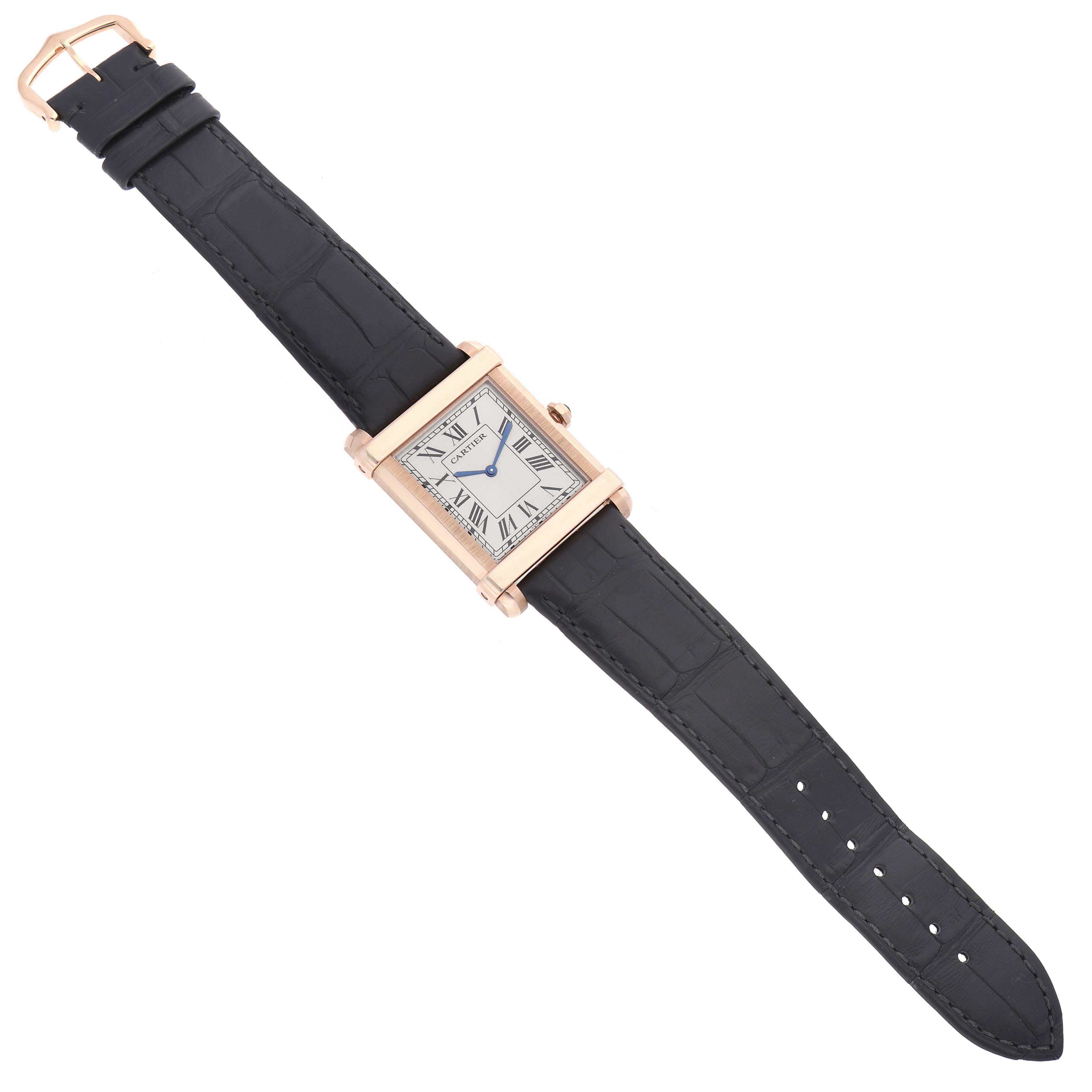 The Cartier Tank Louis WGTA0075 Men's Rose Gold Silver Dial watch is shown from a top-down angle, displaying its rectangular face, strap, and side crown.