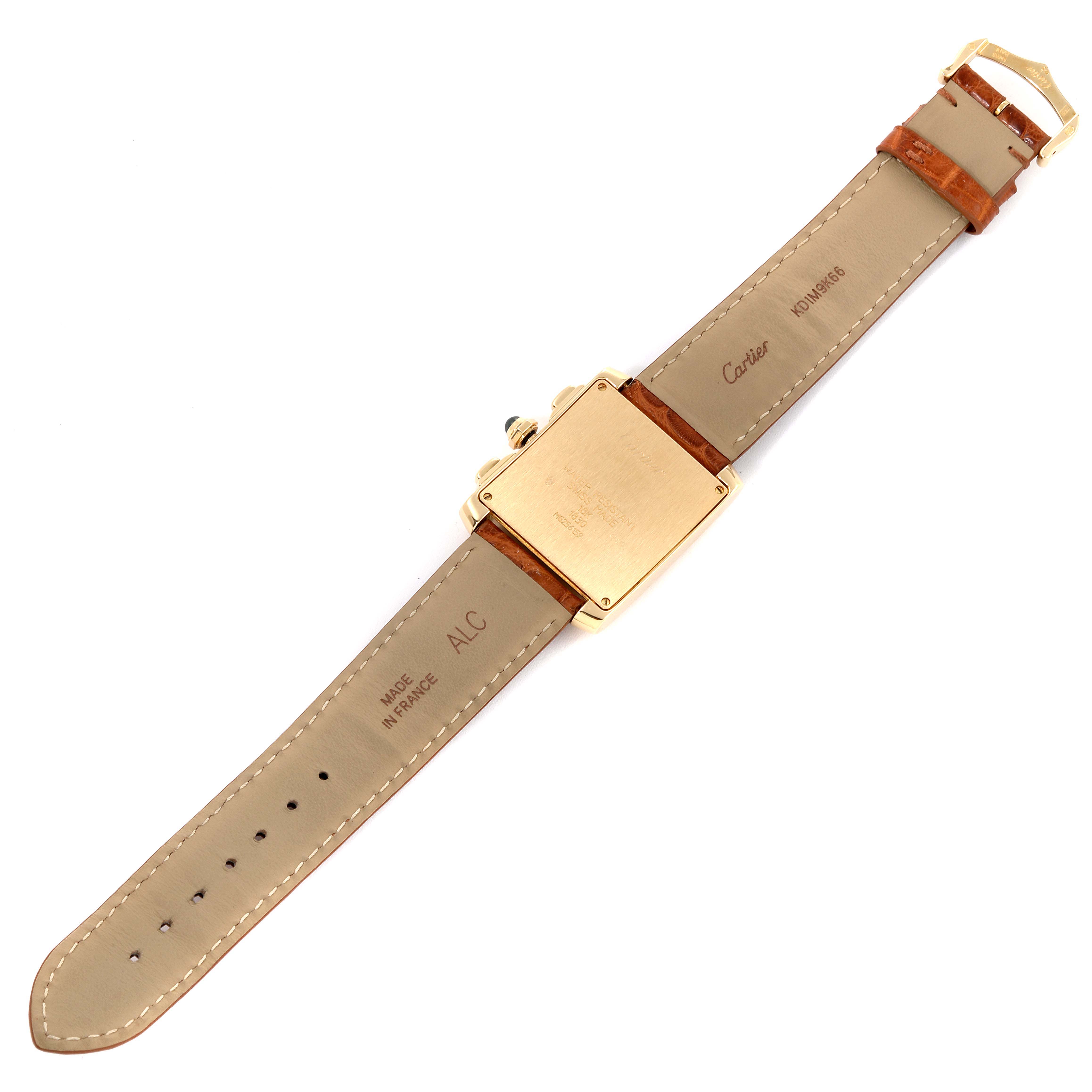 The image shows the back view of a Cartier Tank Francaise W5000556 Men's Yellow Gold Silver Dial W5000556 Men's Yellow Gold Silver Dial watch with its leather strap fully extended.