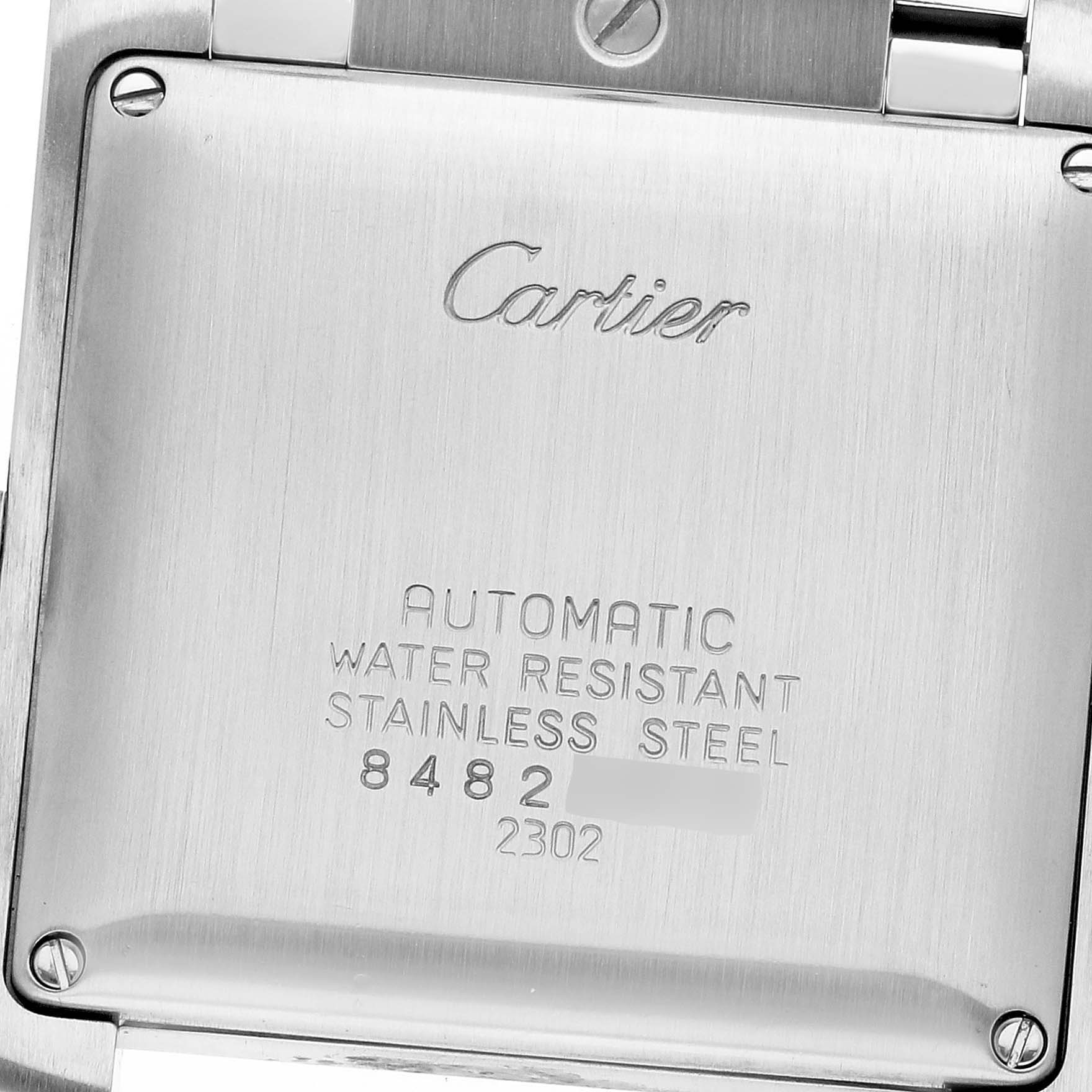 This image shows the back case of the Cartier Tank Française watch, displaying its engravings and stainless steel finish.