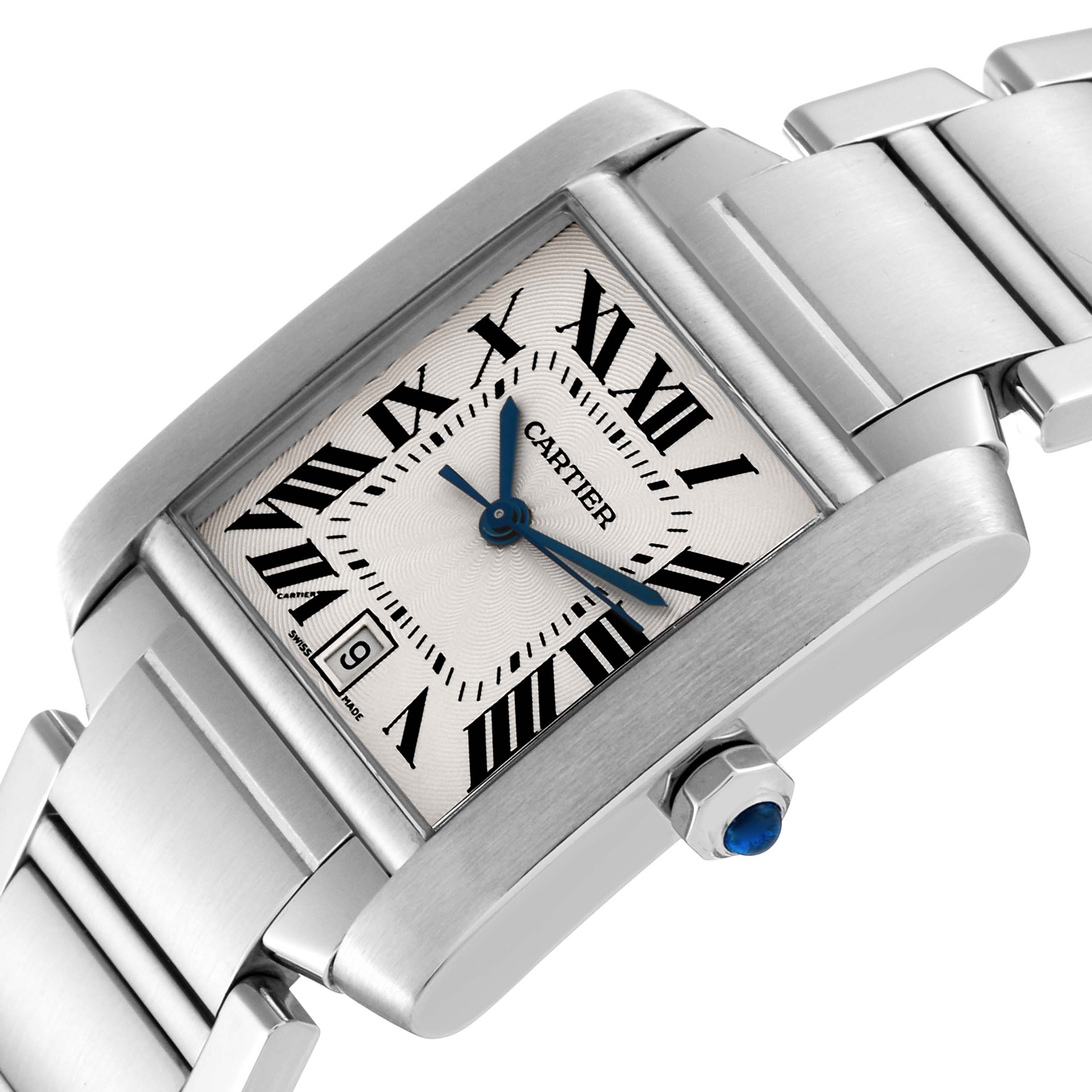 This image shows a close-up of the face and bracelet of a Cartier Tank Francaise W51002Q3 Men's Stainless Steel Silver Dial W51002Q3 Men's Stainless Steel Silver Dial watch, highlighting the Roman numerals and blue hands.