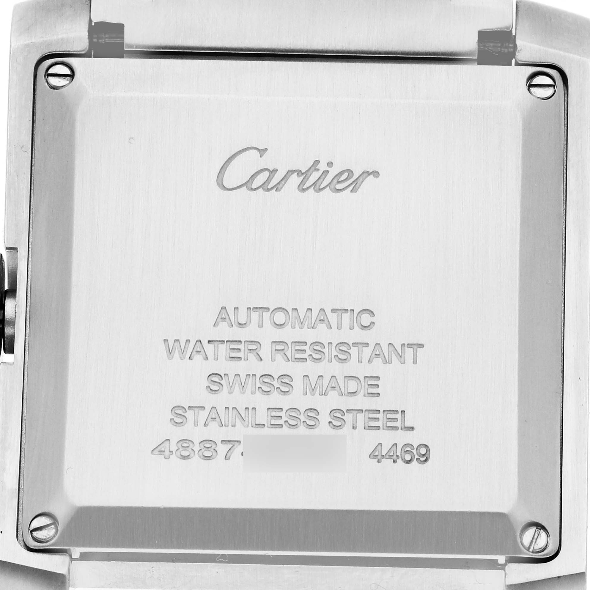 The image shows the back casing of a Cartier Tank Francaise WSTA0067 Men's Stainless Steel Silver Dial WSTA0067 Men's Stainless Steel Silver Dial watch with engraved details.