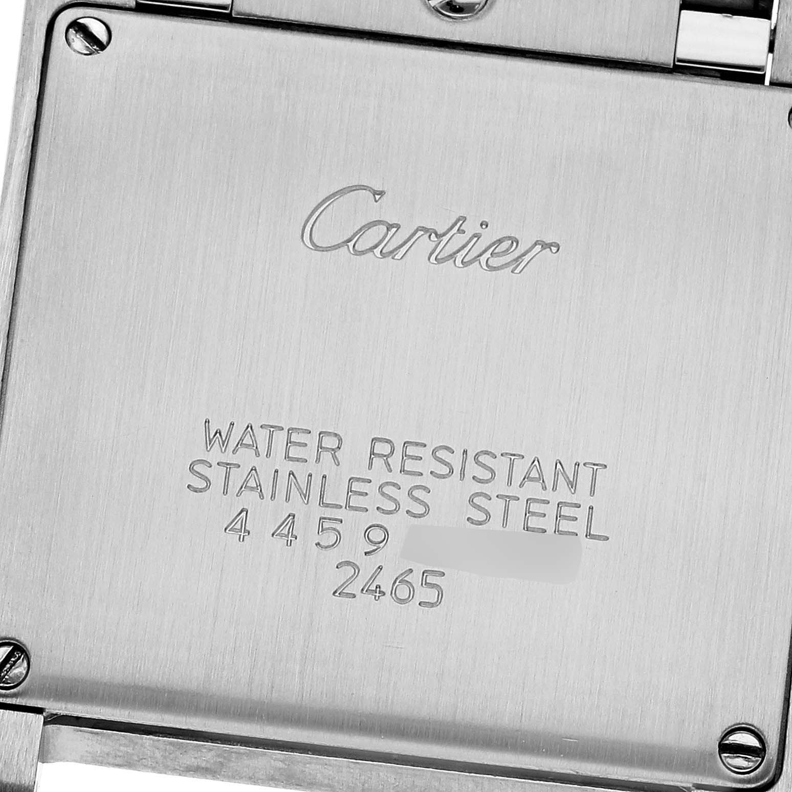 This image shows the back case of a Cartier Tank Francaise W51012Q4 Women
s Steel and Gold (two tone) Silver Dial W51012Q4 Women
s Steel and Gold (two tone) Silver Dial watch with engraved details.