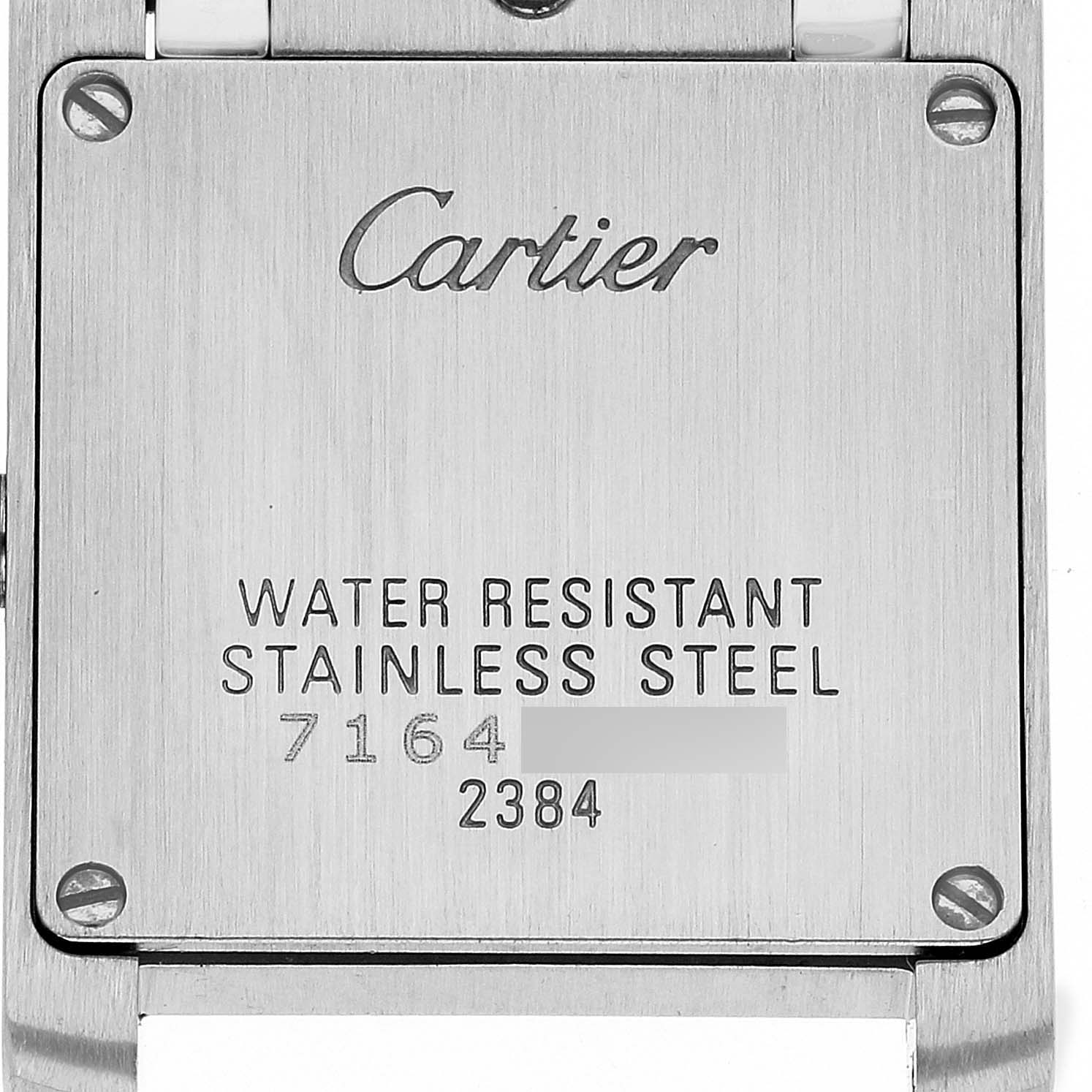 The image shows the back case of a Tank Francaise model watch by Cartier, indicating it is water-resistant and made of stainless steel.