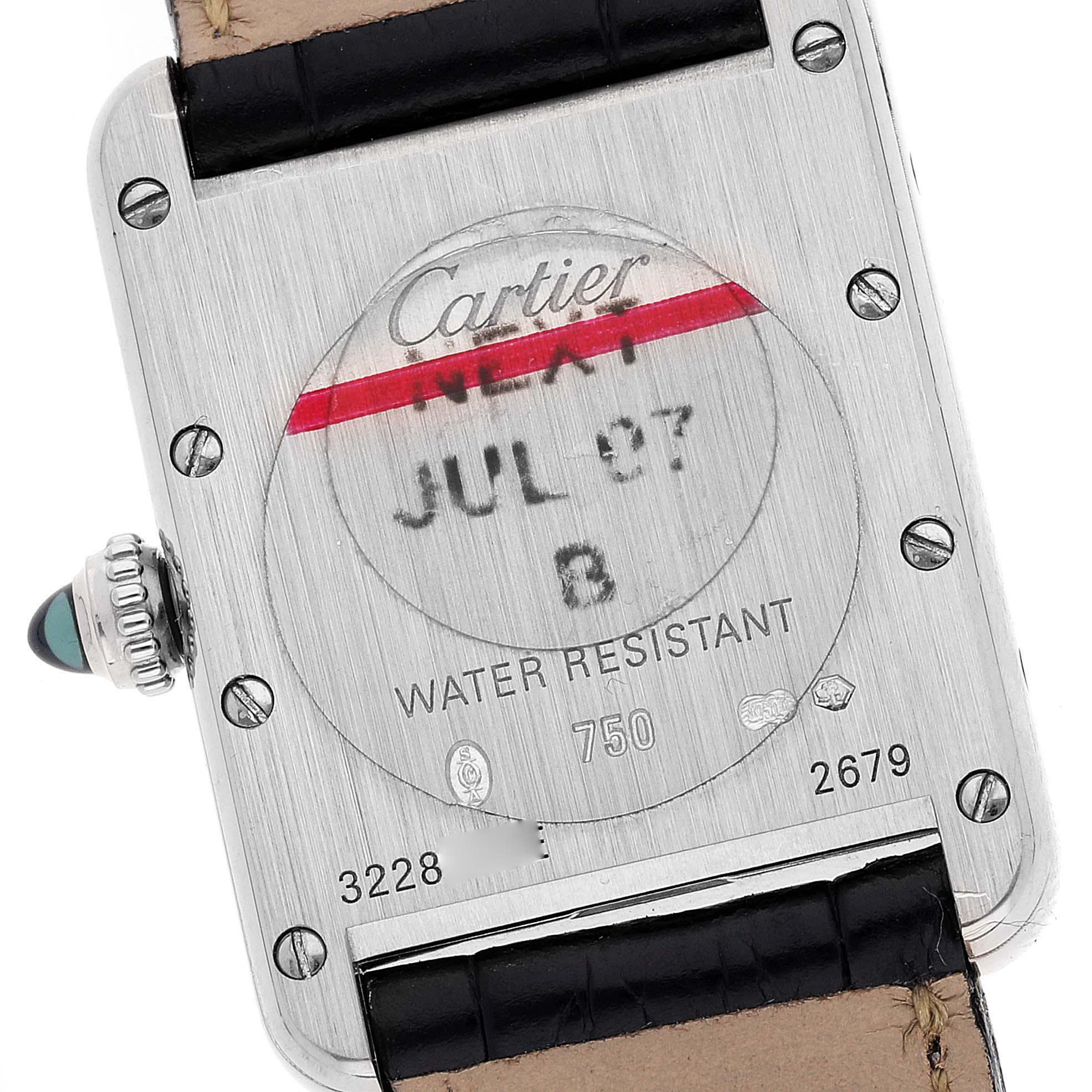 The image shows the back of a Cartier Tank Louis W1541056 Women's White Gold Silver Dial W1541056 Women's White Gold Silver Dial watch, highlighting the case back, screws, and serial numbers.