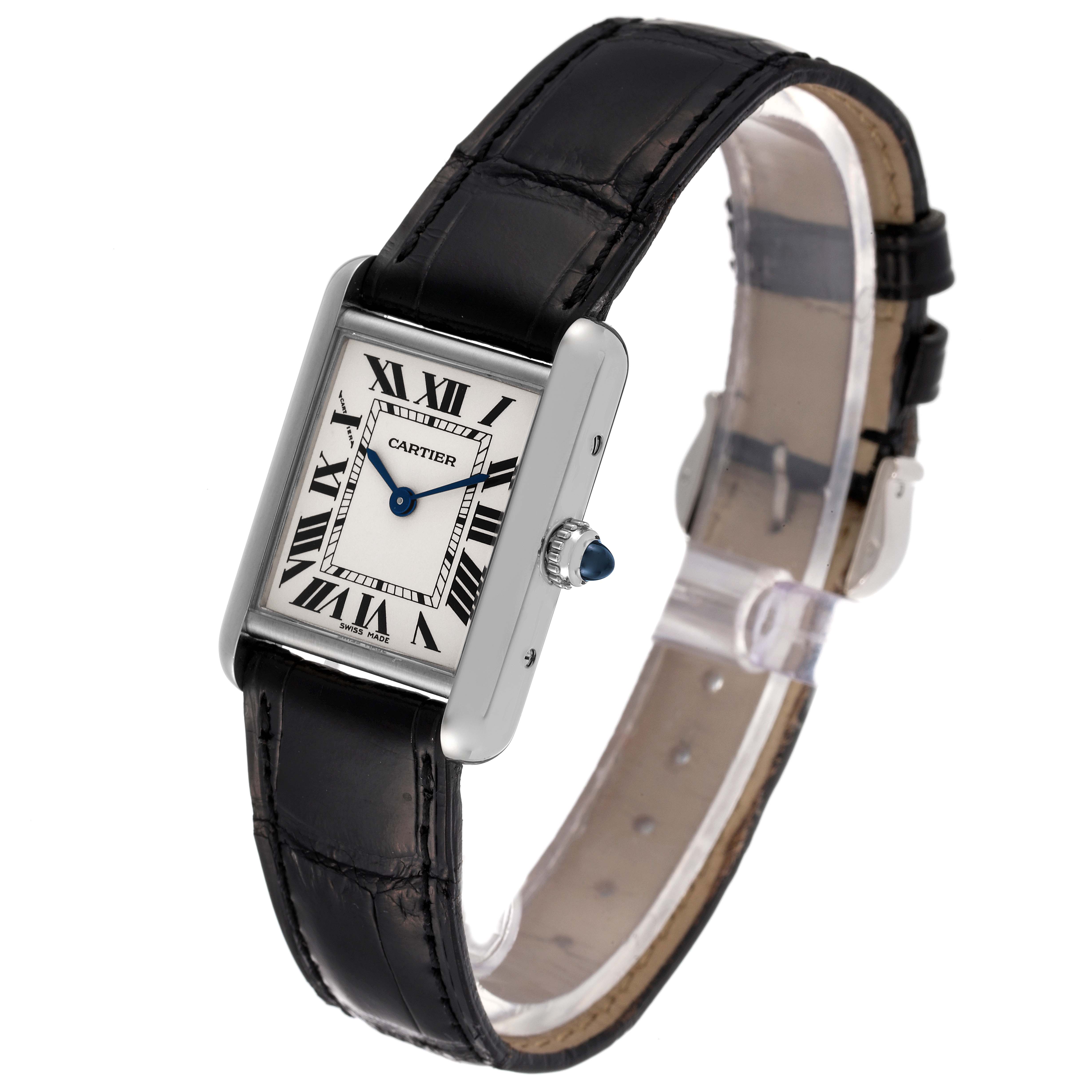 The image shows a Tank Louis Cartier watch at an angled view, highlighting its rectangular face, Roman numerals, and black leather strap.