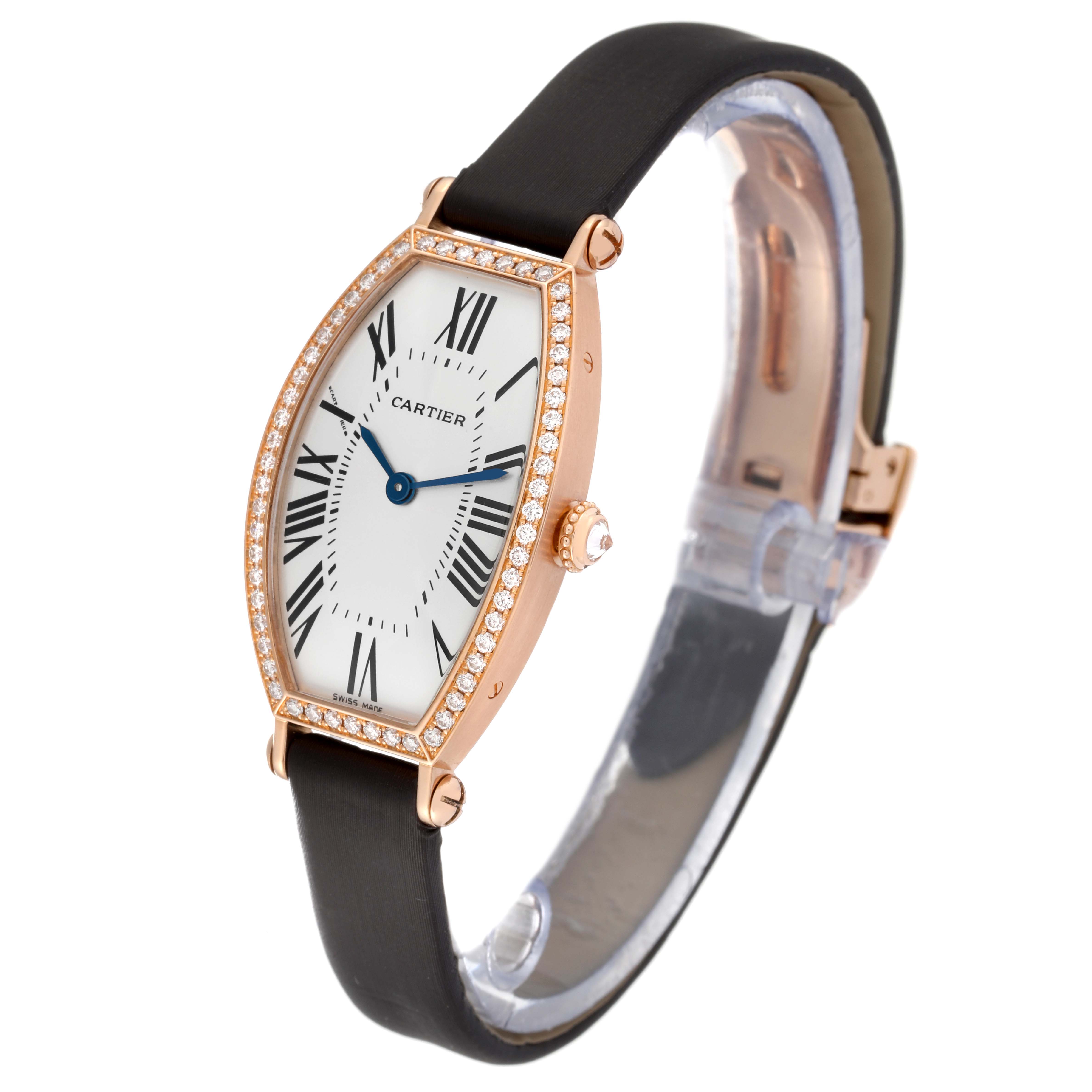 The Cartier Tonneau WE400331 Women
s Rose Gold Silver Dial WE400331 Women
s Rose Gold Silver Dial watch is shown at a slight front-side angle, displaying the face, strap, and bezel.