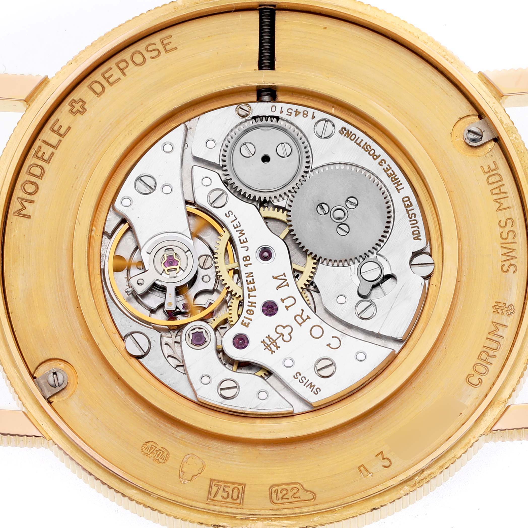 The image shows the back of a Corum Coin Watch 4414556 Men's Yellow Gold Champagne Dial 4414556 Men's Yellow Gold Champagne Dial, displaying its mechanical movement and internal components.
