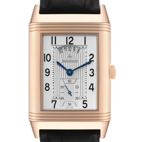 This Jaeger-LeCoultre Reverso watch is shown from the front, highlighting its rectangular face, gold case, and black strap.