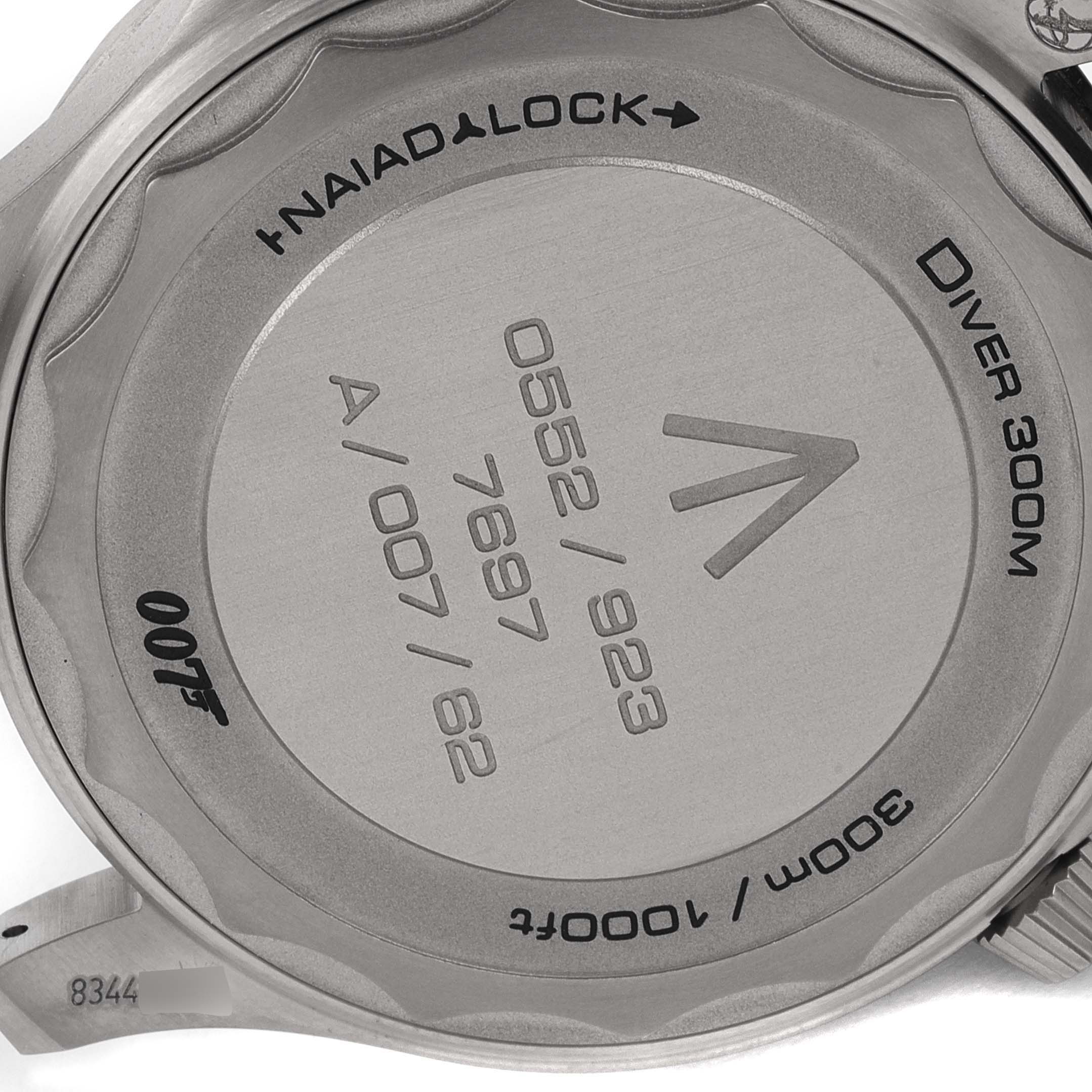 This image shows the back casing of an Omega Seamaster 210.92.42.20.01.001 Men's Titanium Brown Dial 210.92.42.20.01.001 Men's Titanium Brown Dial Diver 300M with engraved serial numbers.