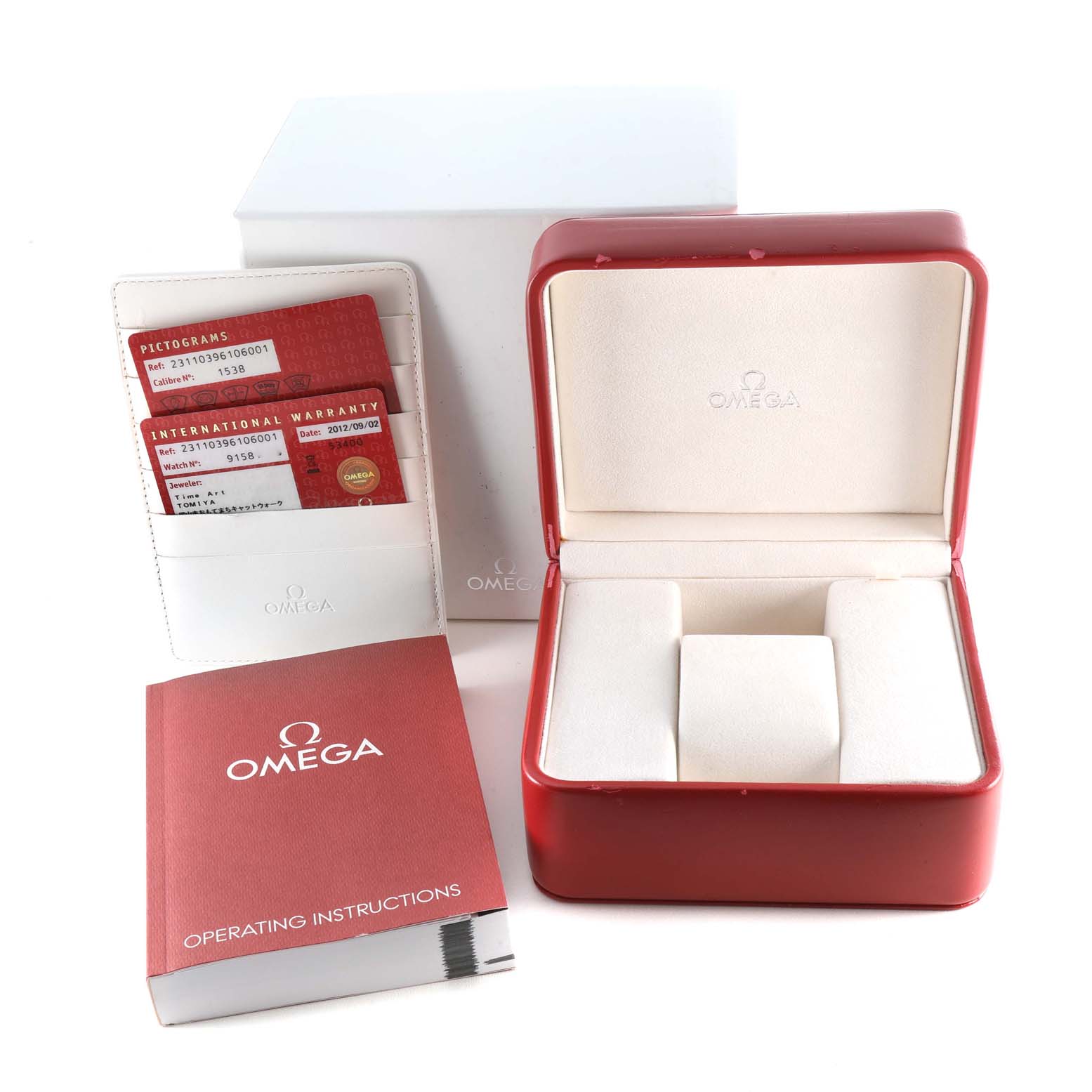 This image shows an Omega Aqua Terra 231.10.39.61.06.001 Men's Stainless Steel Grey Dial 231.10.39.61.06.001 Men's Stainless Steel Grey Dial watch box, warranty cards, and an operating instructions booklet from a top-side angle.