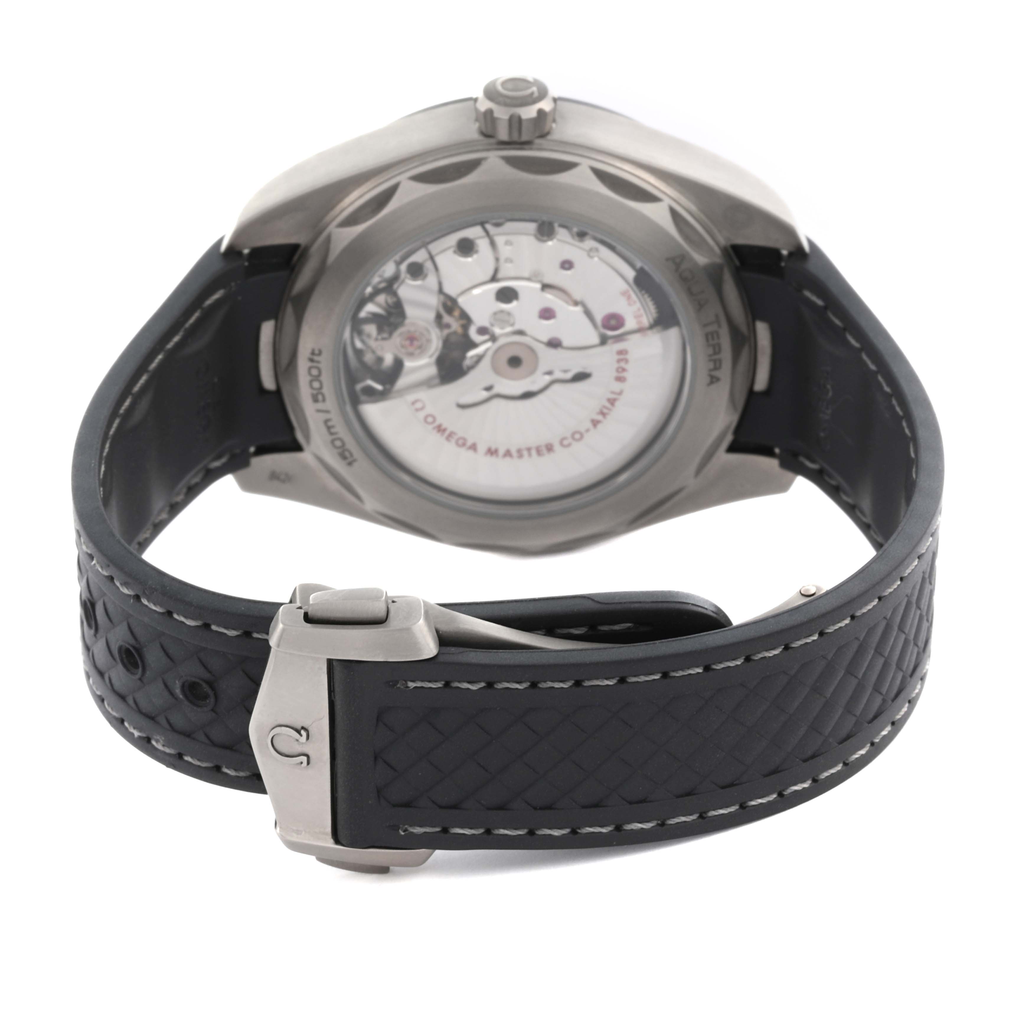 The Omega Aqua Terra 220.92.43.22.99.001 Men's Titanium Black Dial 220.92.43.22.99.001 Men's Titanium Black Dial watch is shown from the back, displaying the movement through a transparent case back and featuring a textured strap.