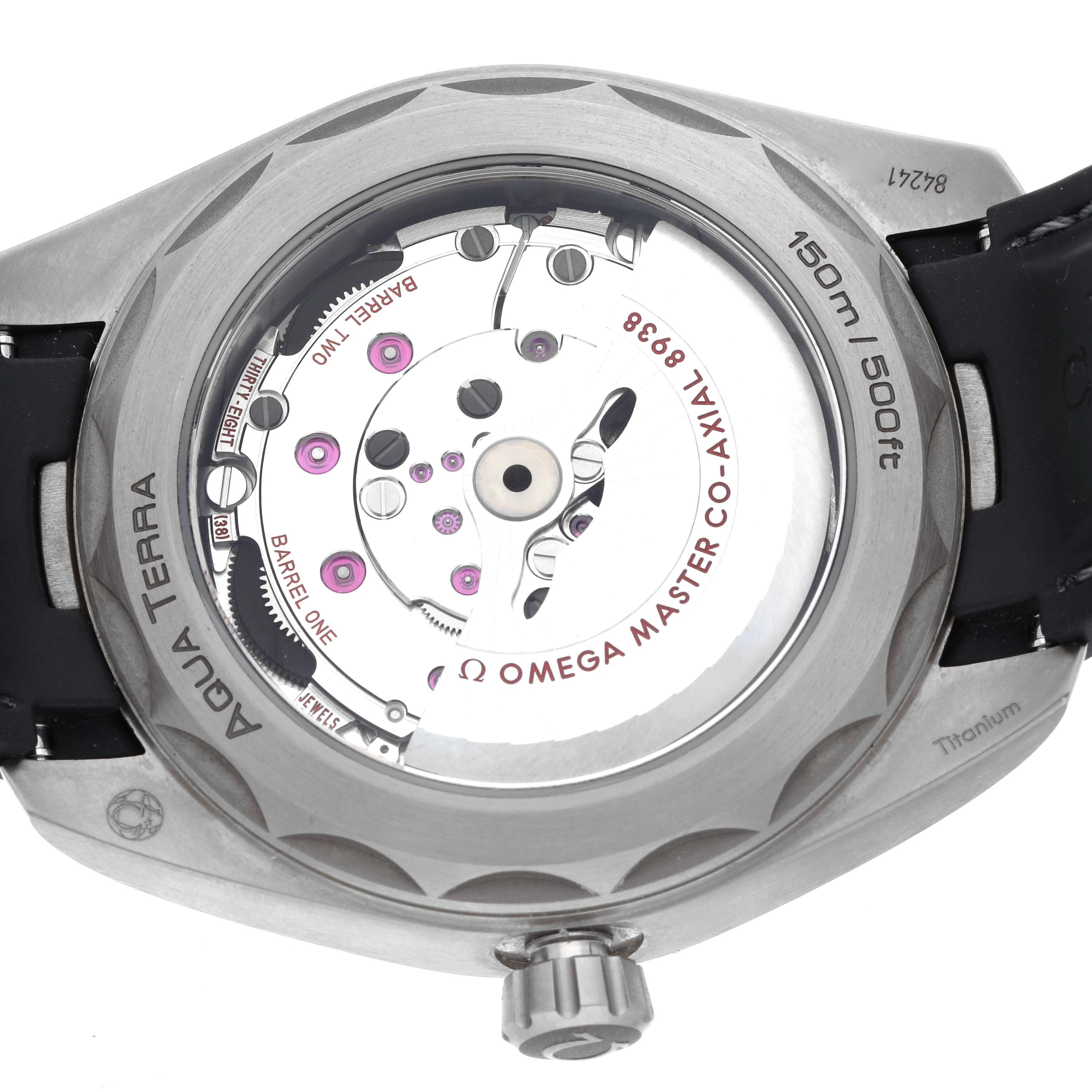 The image shows the back of the Omega Aqua Terra 220.92.43.22.99.001 Men's Titanium Black Dial 220.92.43.22.99.001 Men's Titanium Black Dial watch, highlighting the movement mechanism and water resistance markings.