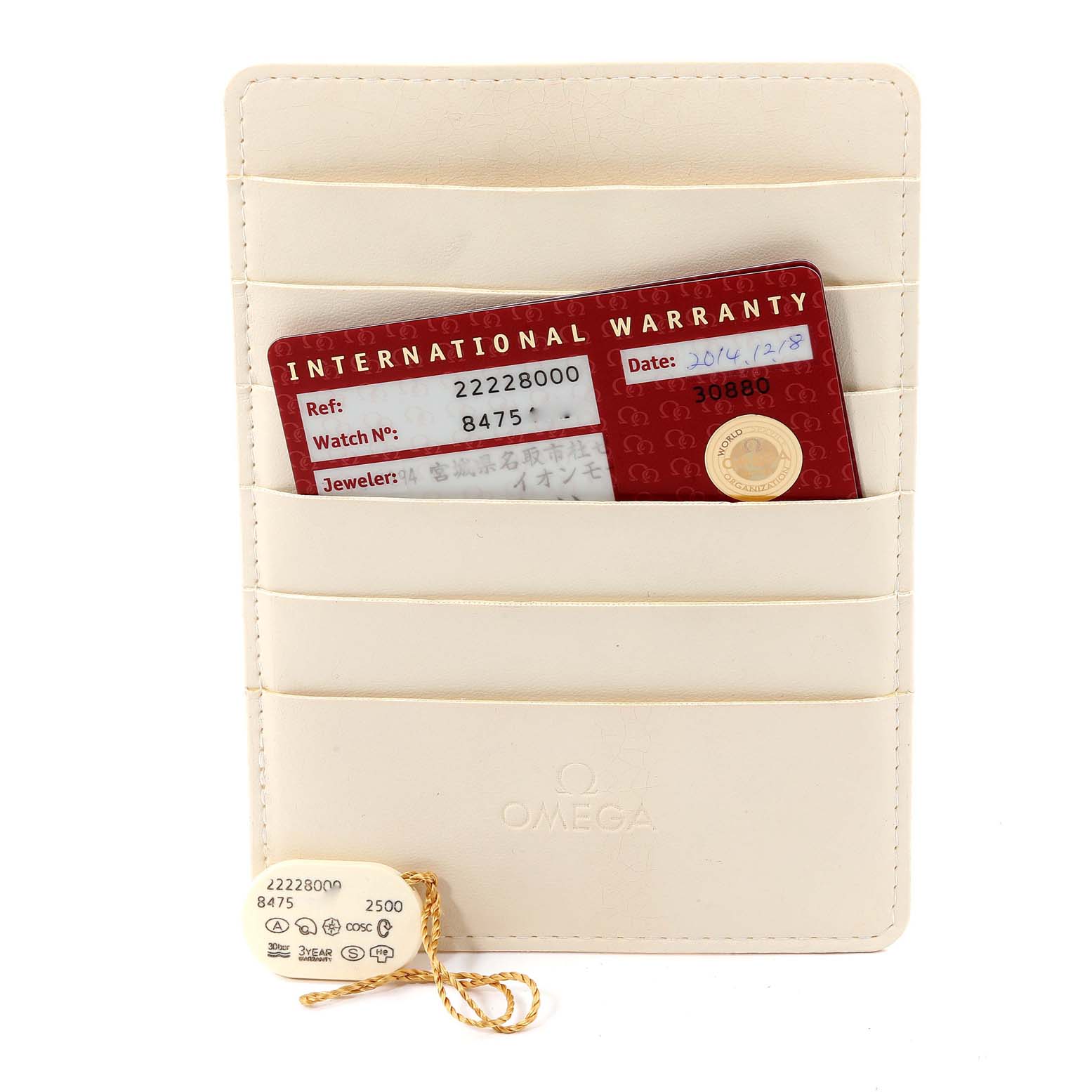 This image shows an Omega Seamaster 2222.80.00 Men's Stainless Steel Blue Dial 2222.80.00 Men's Stainless Steel Blue Dial's warranty card and tag inside a cream-colored cardholder.