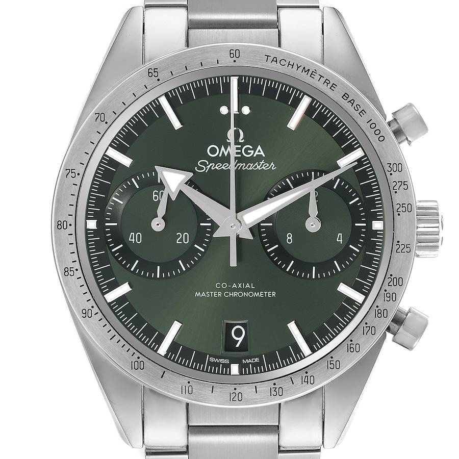 The image shows a front view of the Omega Speedmaster, displaying its green dial, subdials, tachymeter bezel, and bracelet.