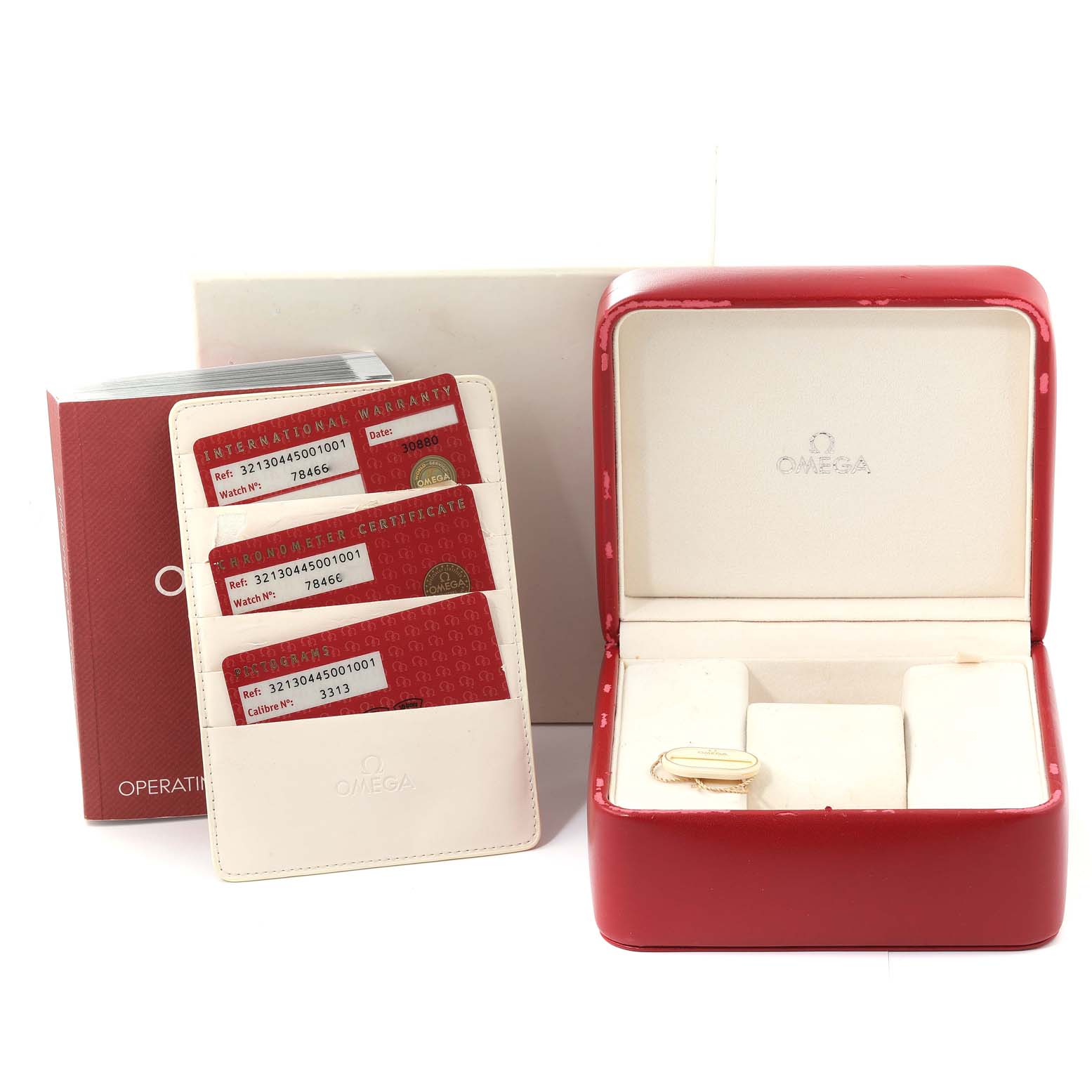 The image shows a box for the Omega Speedmaster 321.30.44.50.01.001 Men's Stainless Steel Black Dial 321.30.44.50.01.001 Men's Stainless Steel Black Dial watch, warranty cards, and an operation manual from a front angle.