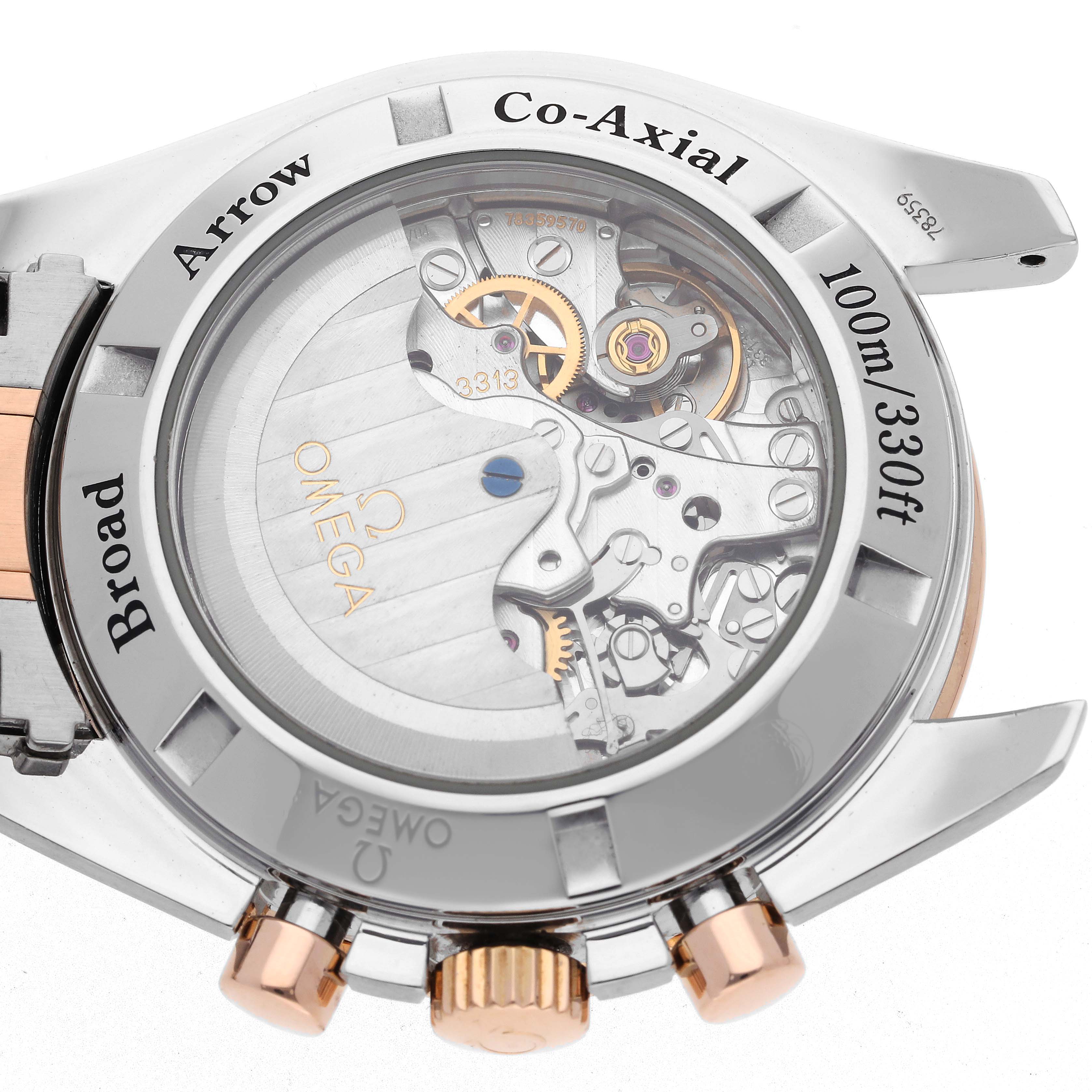 The image shows the back of an Omega Speedmaster 321.90.42.50.13.001 Men's Steel and Gold (two tone) Brown Dial 321.90.42.50.13.001 Men's Steel and Gold (two tone) Brown Dial, highlighting the Co-Axial movement and mechanical components.