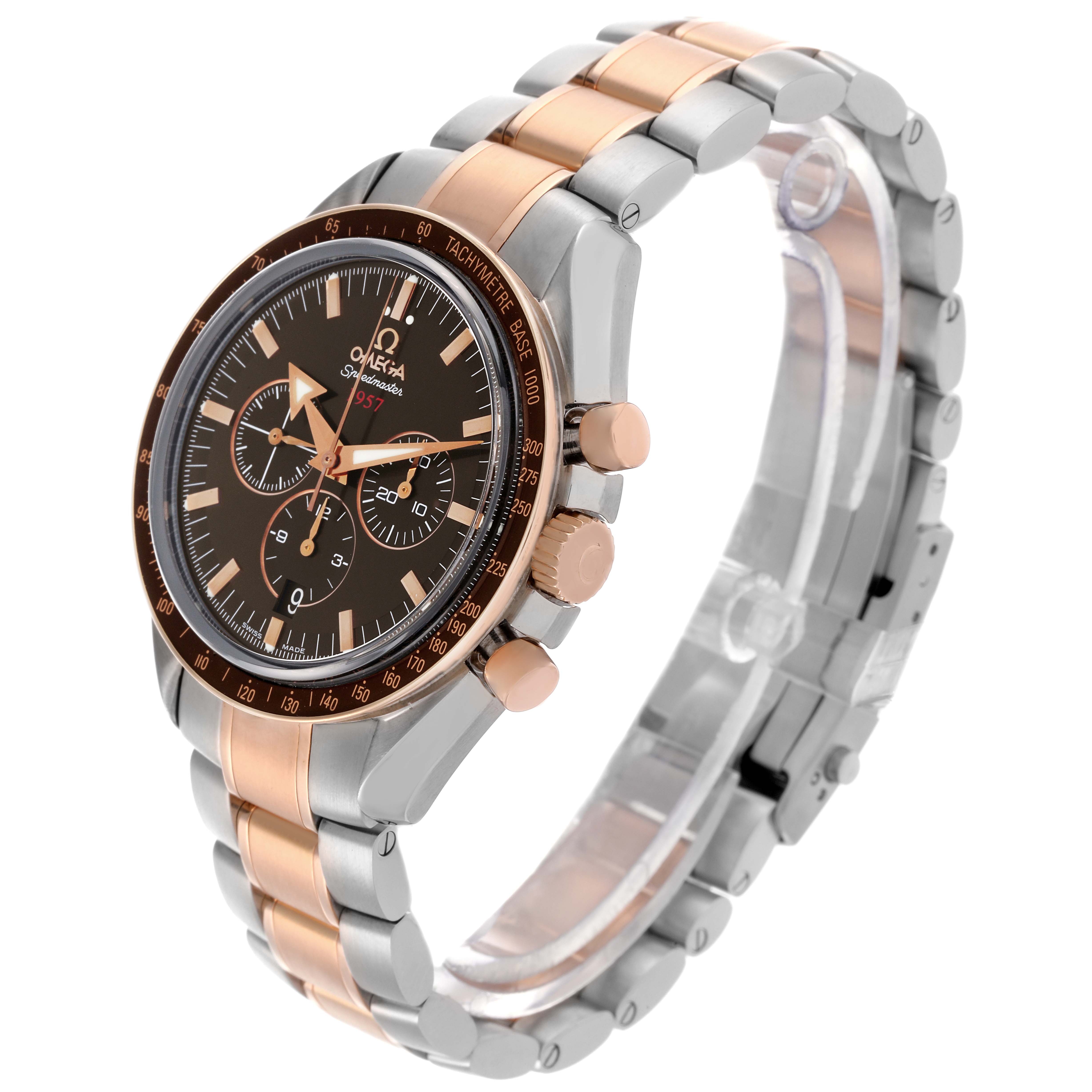 The Omega Speedmaster 321.90.42.50.13.001 Men's Steel and Gold (two tone) Brown Dial 321.90.42.50.13.001 Men's Steel and Gold (two tone) Brown Dial watch is shown at an oblique angle, highlighting the face, bezel, buttons, and part of the bracelet.