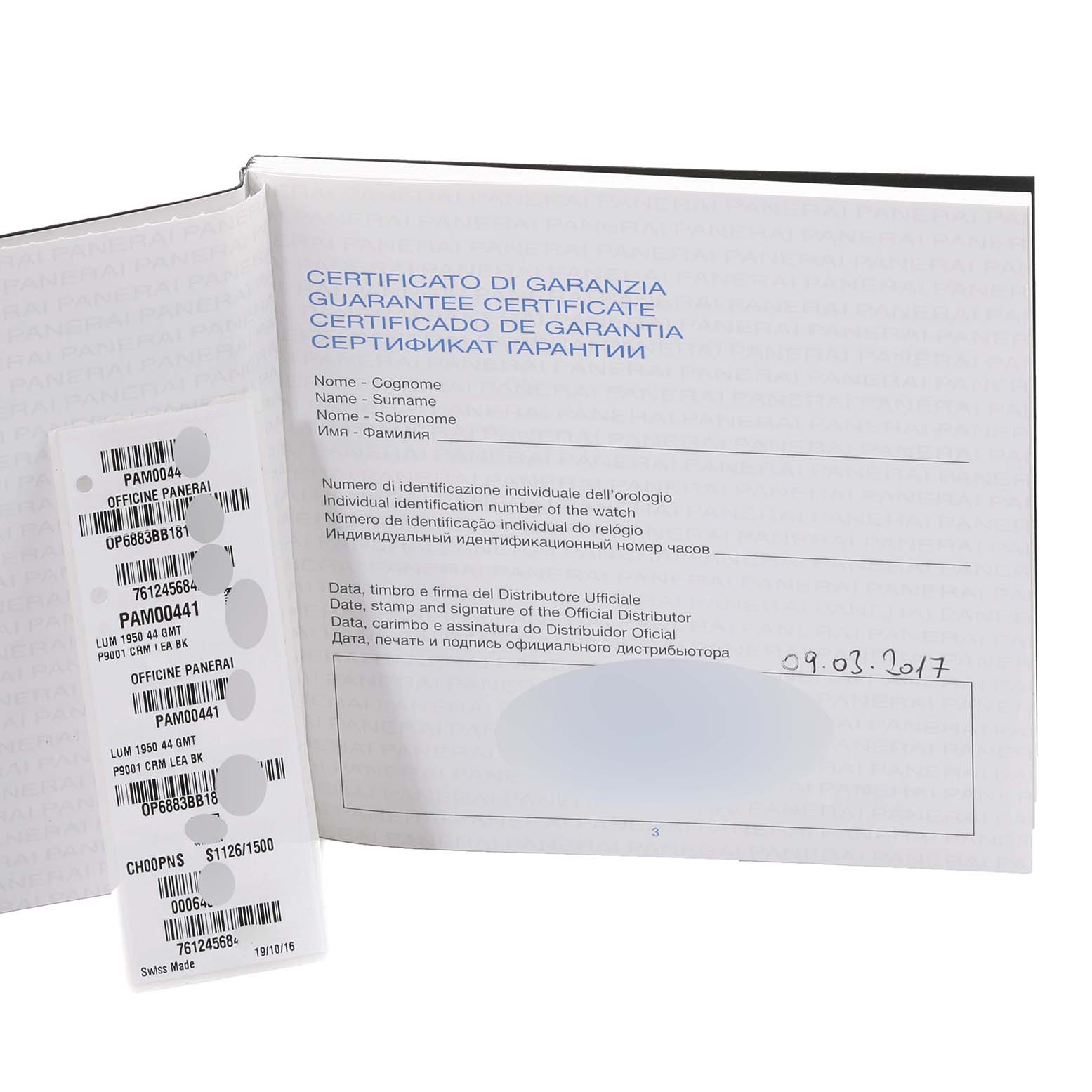 The image shows the warranty certificate and serial number stickers for a Luminor model watch by Panerai.